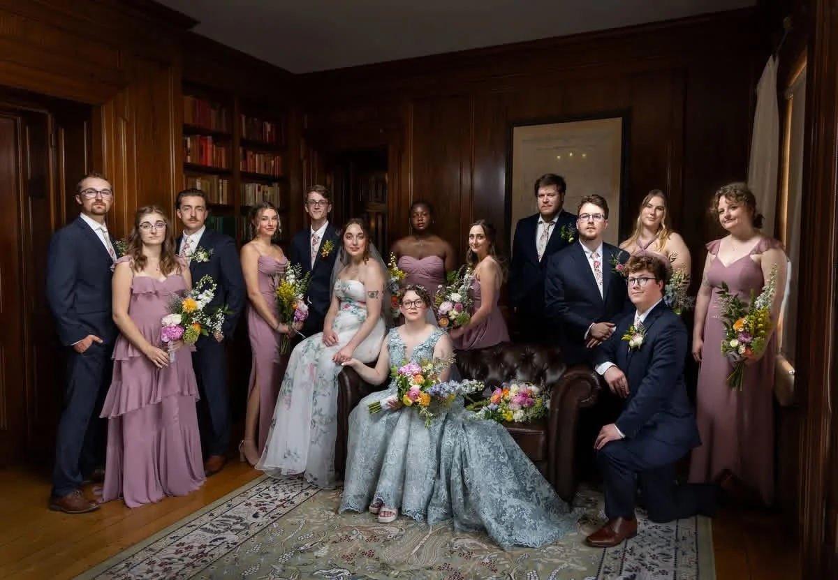 Wedding party in library of Michigan wedding venue