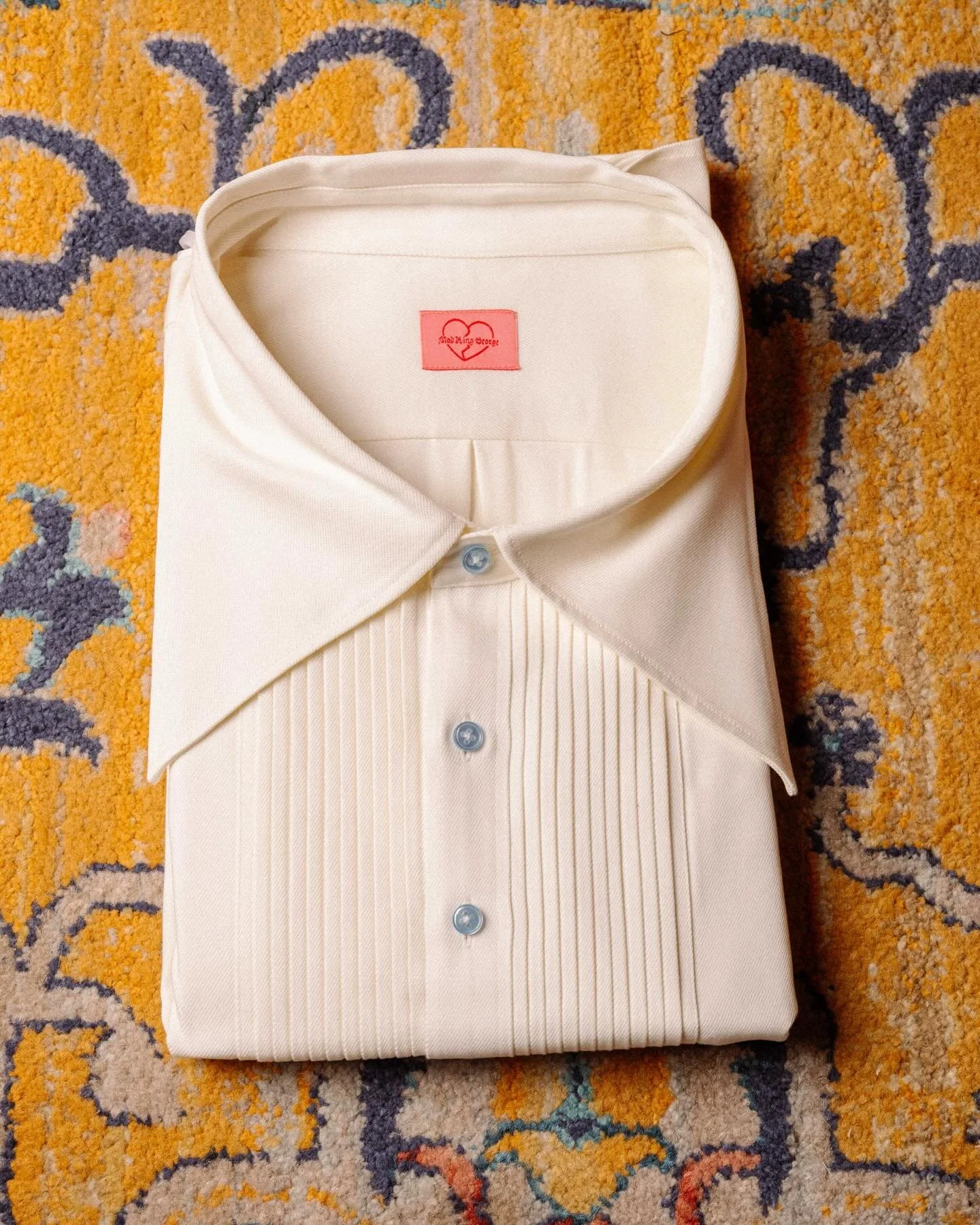 The perfect evening shirt does exist and you are looking at it. Featuring the Mad King George Dagger Collar, a pleated front and beautiful blue buttons. 

Make yours today!

#menswear #womenswear #bespoke #madetomeasure #style