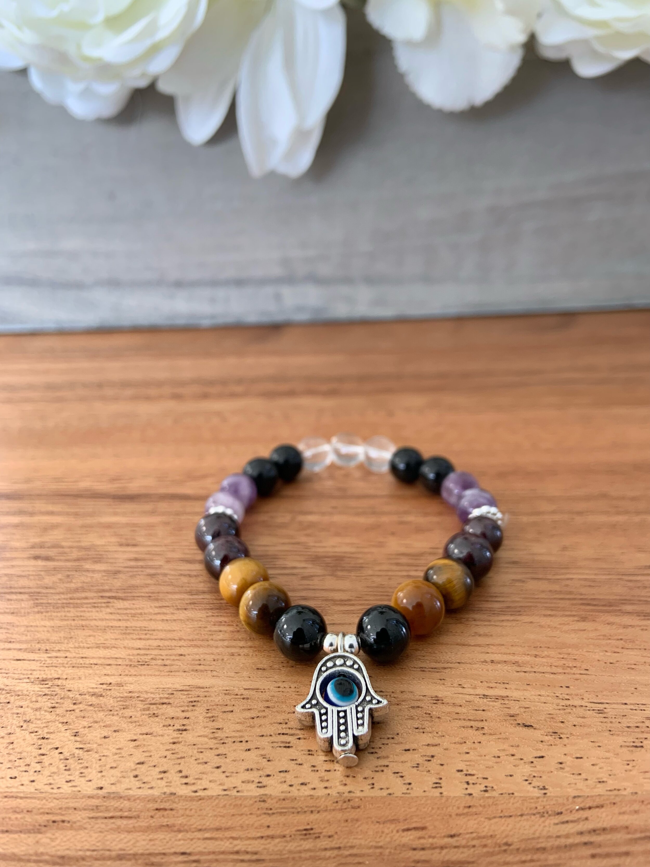 Amazon.com: Quadruple protection evil eye bracelets for men （evil eye,  tigers eye,hematite, obsidian）A handmade beaded crystal healing bracelet  that can bring luck, happiness and protection(8mm elastic) : Handmade  Products