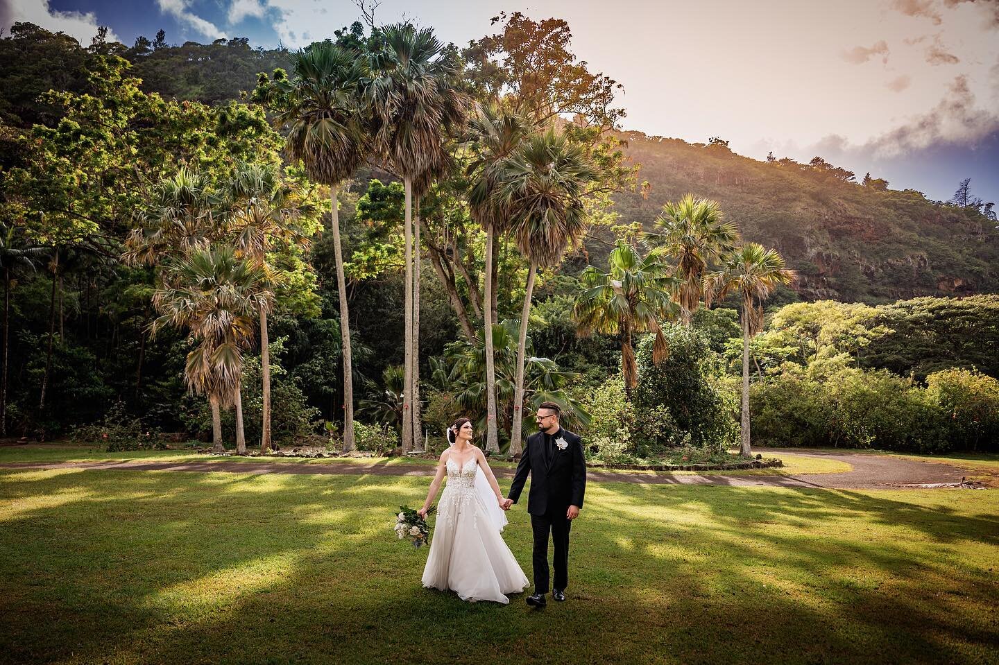 A wedding in Hawaii is a dream come true with its stunning scenery and tropical feel. The bride and groom exchanged vows with a backdrop of lush greenery. There were cascading waterfalls and crystal-clear waters. We took in a beautiful sunset as the 