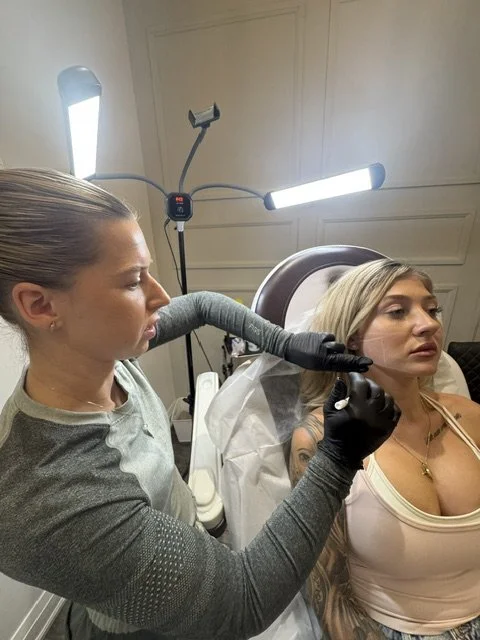 Nurse injector student completing supervised live-model dermal filler training during private 1:1 injector training in Vaughan.