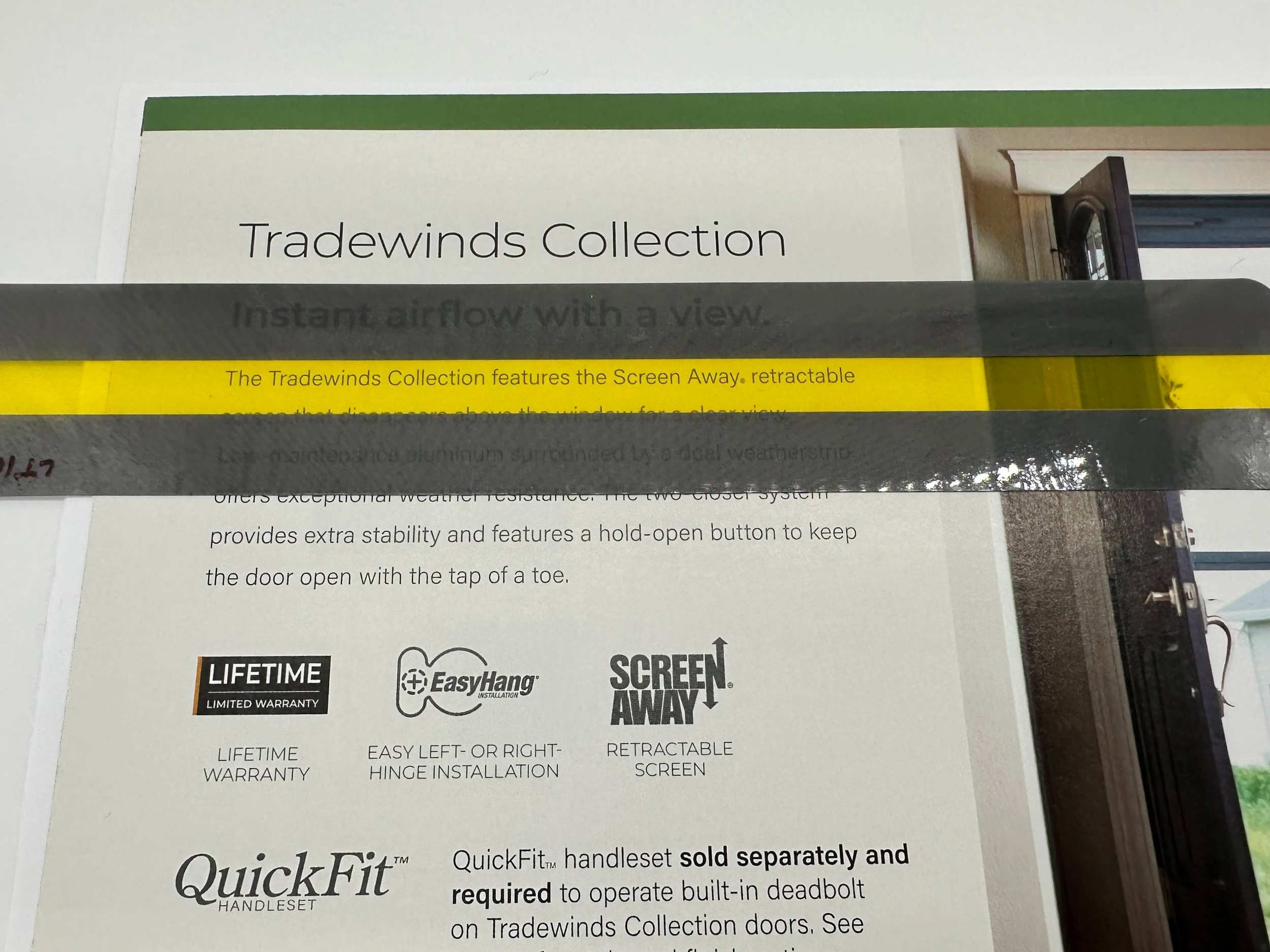 A bright yellow strip of transparent plastic highlighting the line in a book