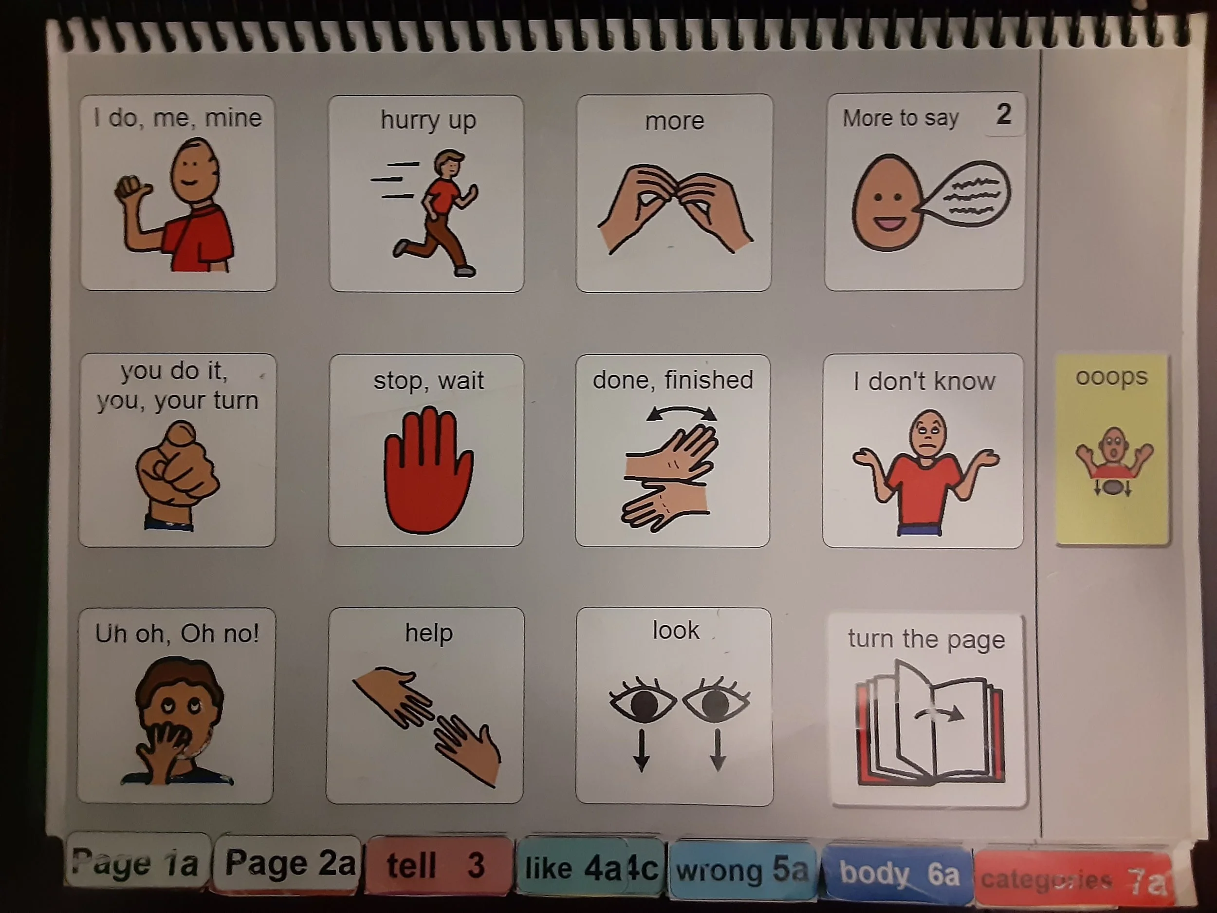 an booklet with picture icons along with matching words