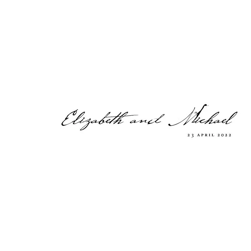 Elegant wedding invitation with black cursive font on a white background, featuring names Elizabeth and Michael and the date April 23, 2022.
