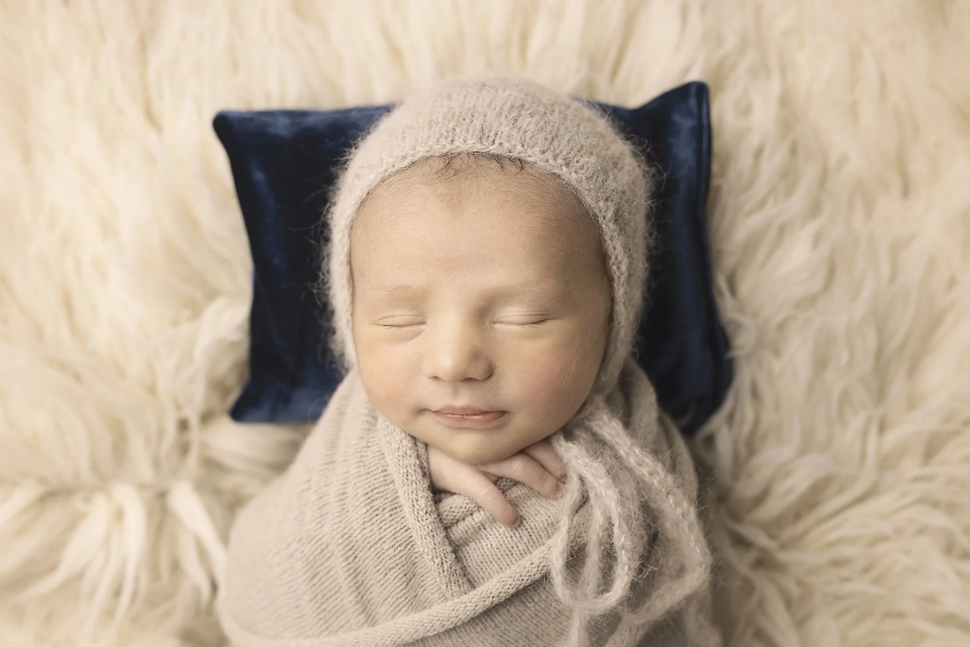 baby boy asleep on blue pillow, newborn photographer, penrith