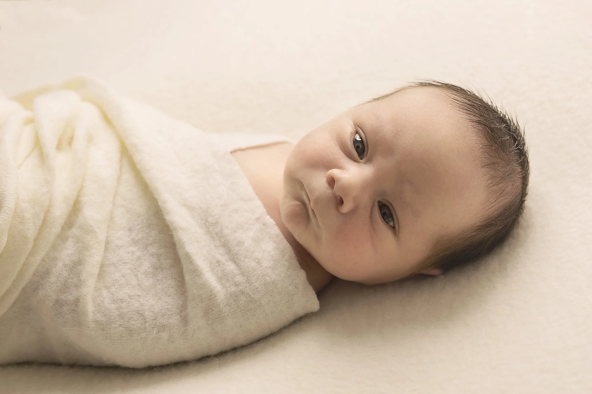 awake baby wrapped in cream, newborn photography, penrith