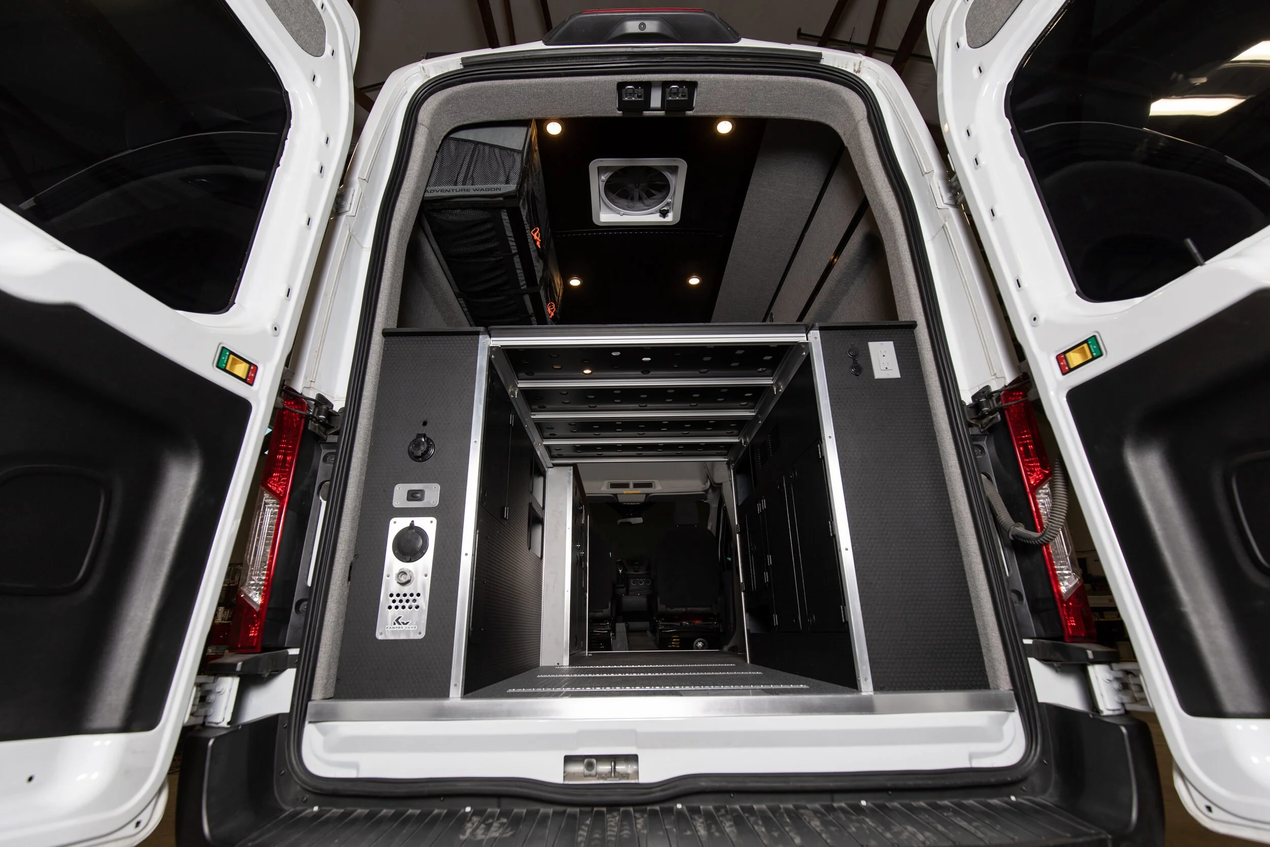 03-transit-148-camper-van-rear-doors-open-bike-garage.jpg