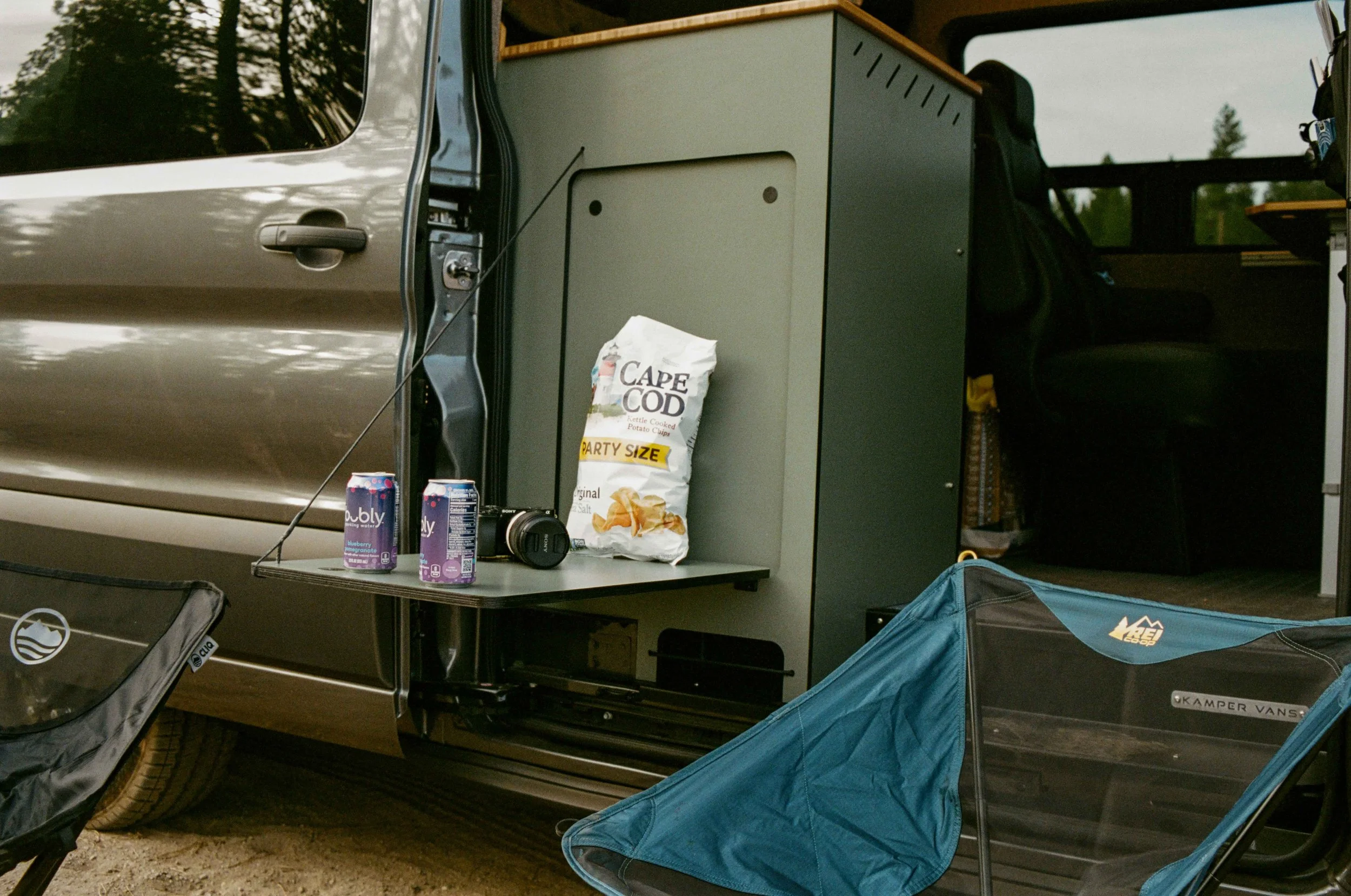 kamper-vans-exterior-folding-table-camping-setup.jpg