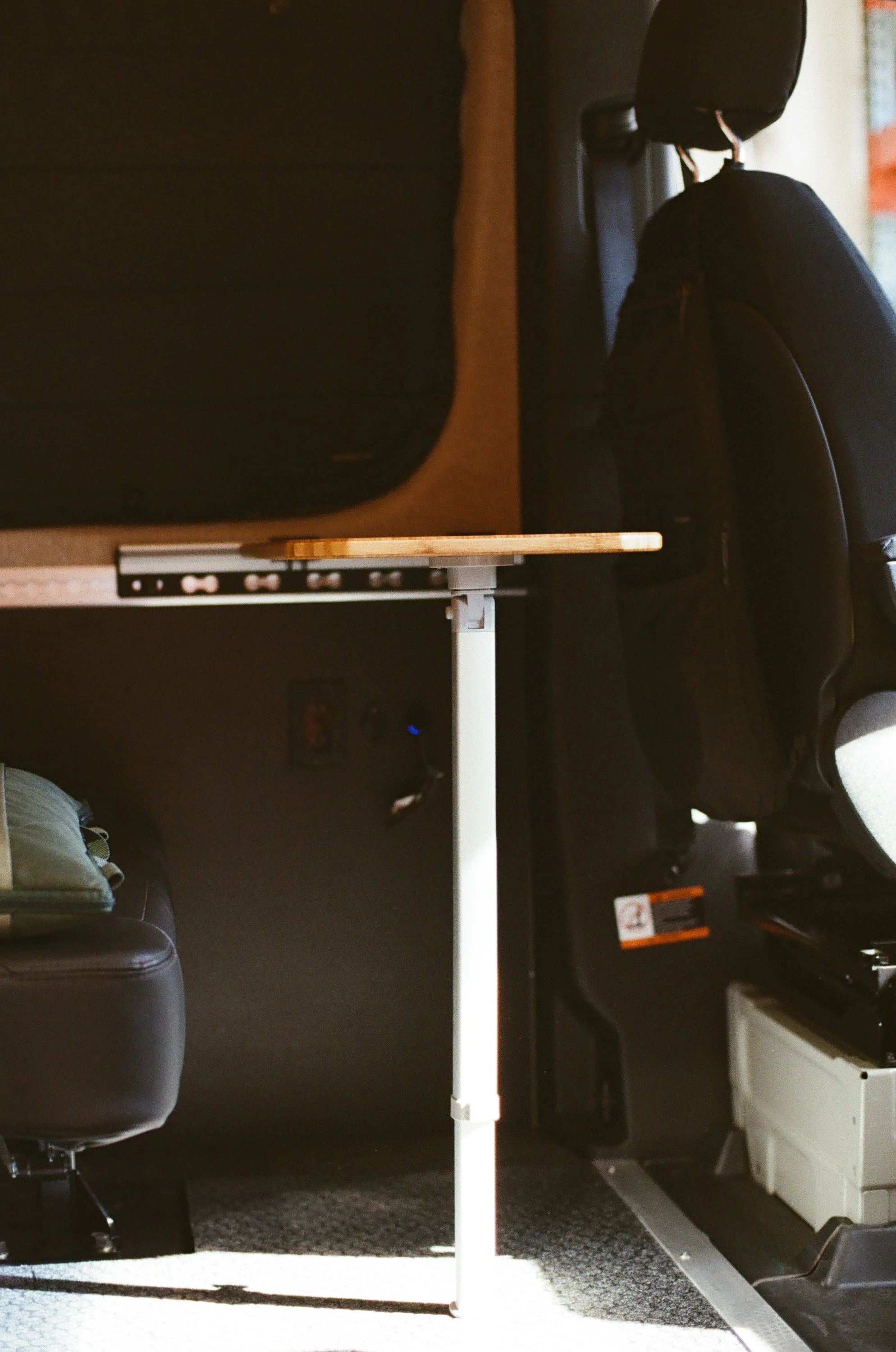 Flip Up Table Workspace in Sprinter Camper Van.jpg