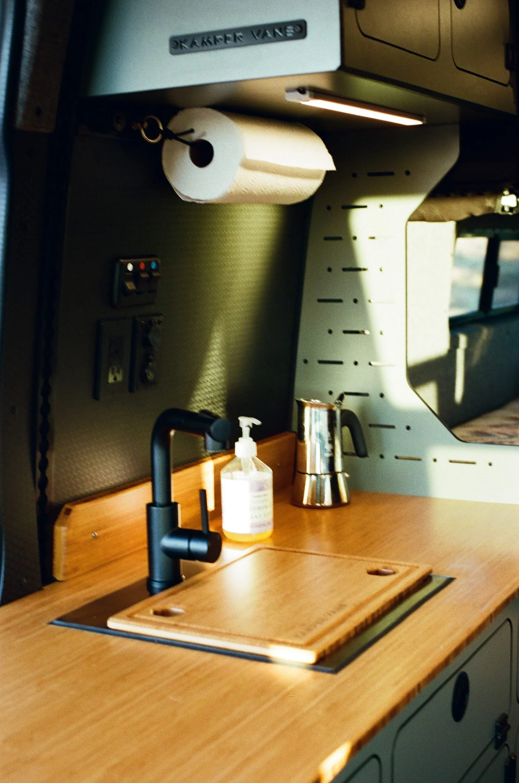 09-bamboo-countertop-folding-faucet-sprinter-170-camper-van-galley.jpg