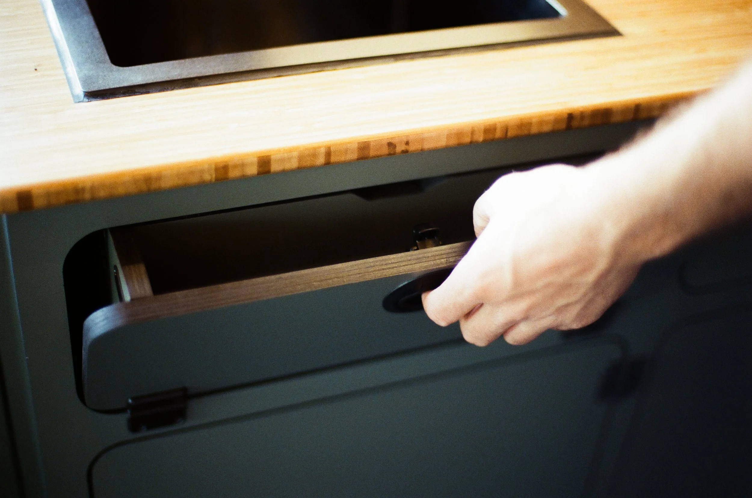 Drawer Storage in Custom Sprinter Camper Van.jpg