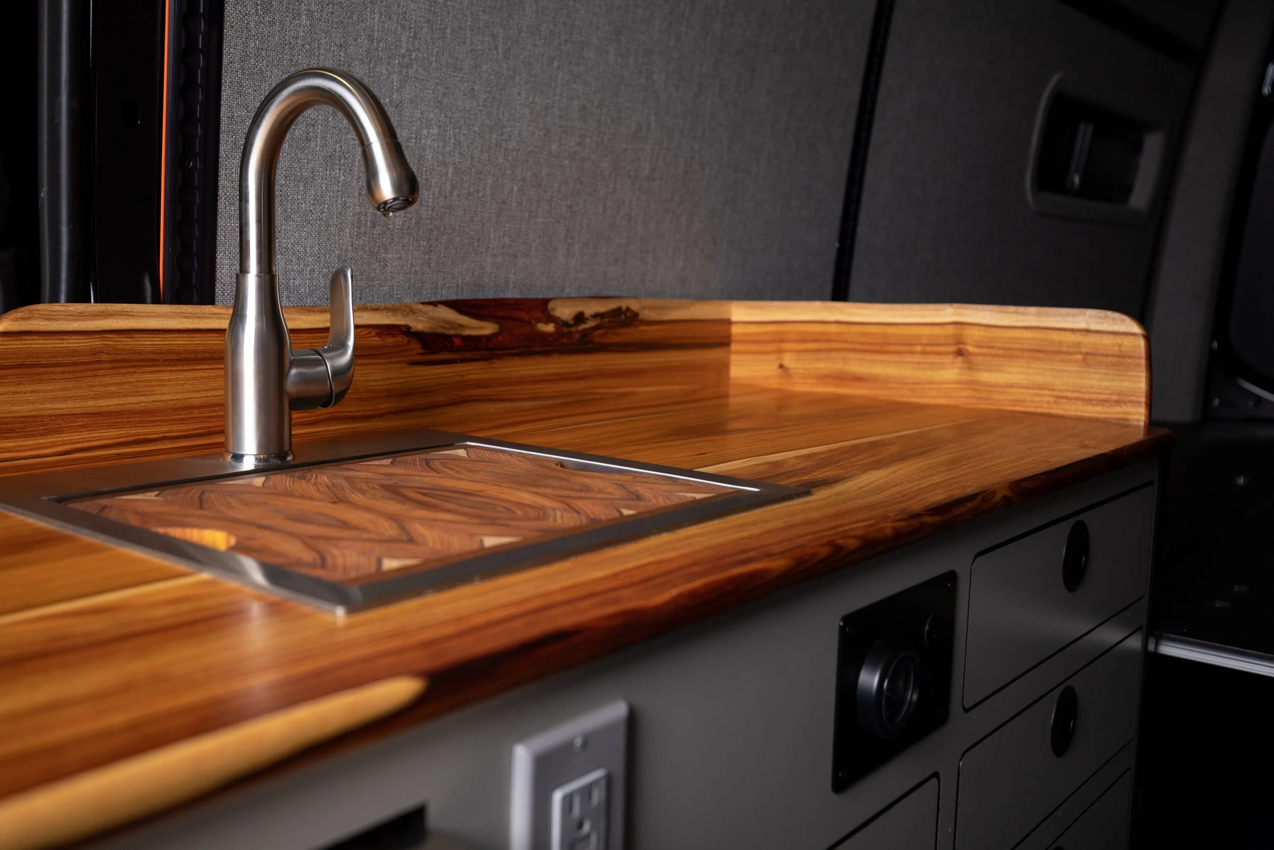 04-custom-hardwood-countertop-and-sink-camper-van.jpg