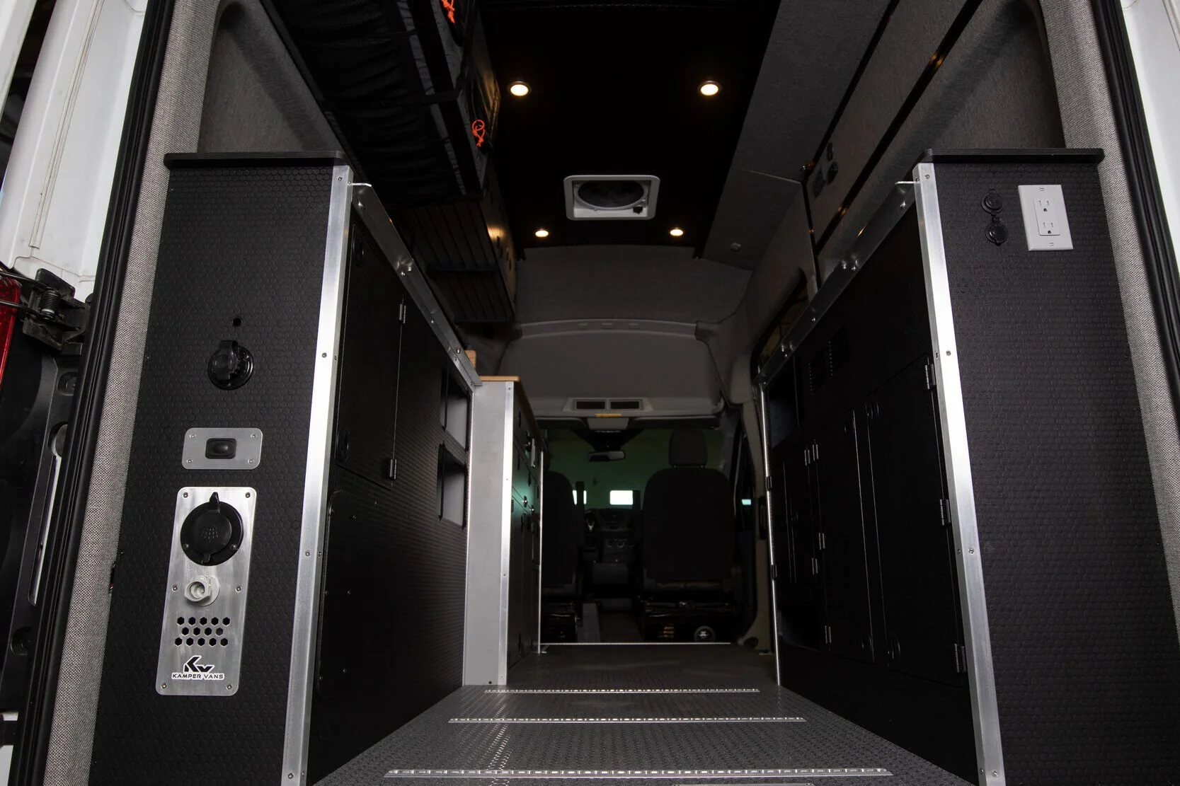 11-transit-148-camper-van-interior-aisle-to-rear-garage.jpg