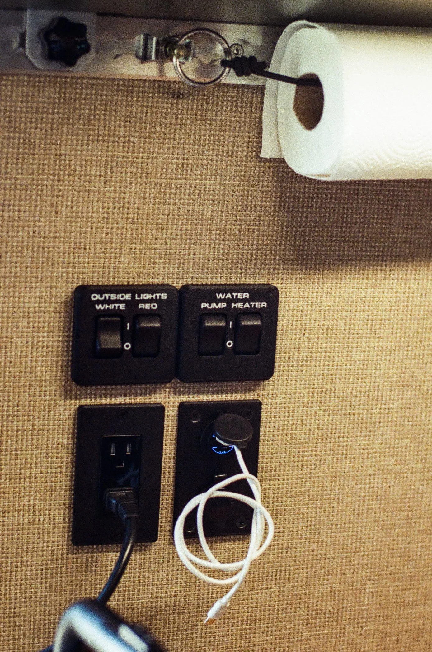 Camper Van Switch Panel and Charging Outlets.jpg