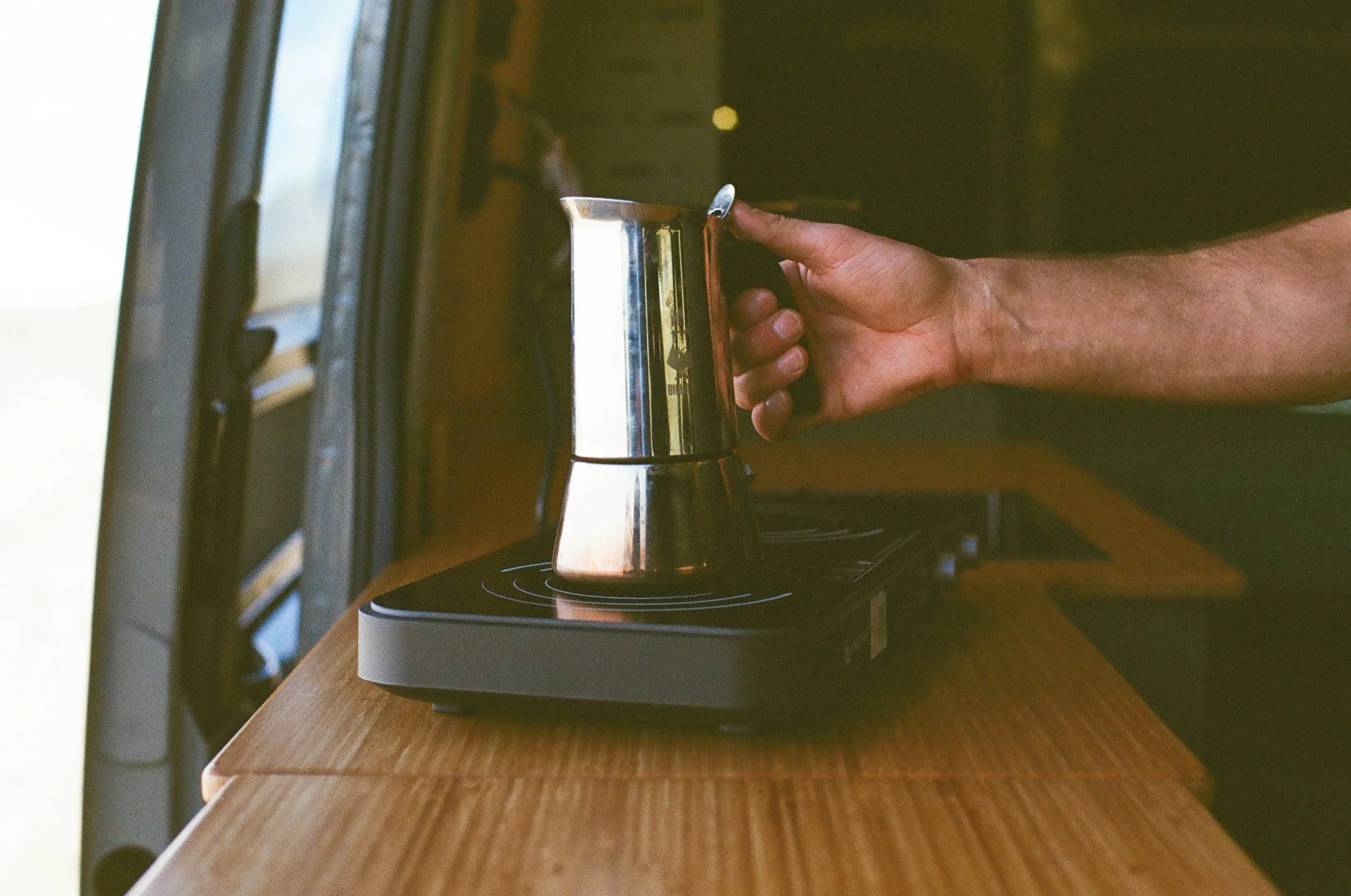 Coffee Setup in Custom Sprinter Camper Van.jpg
