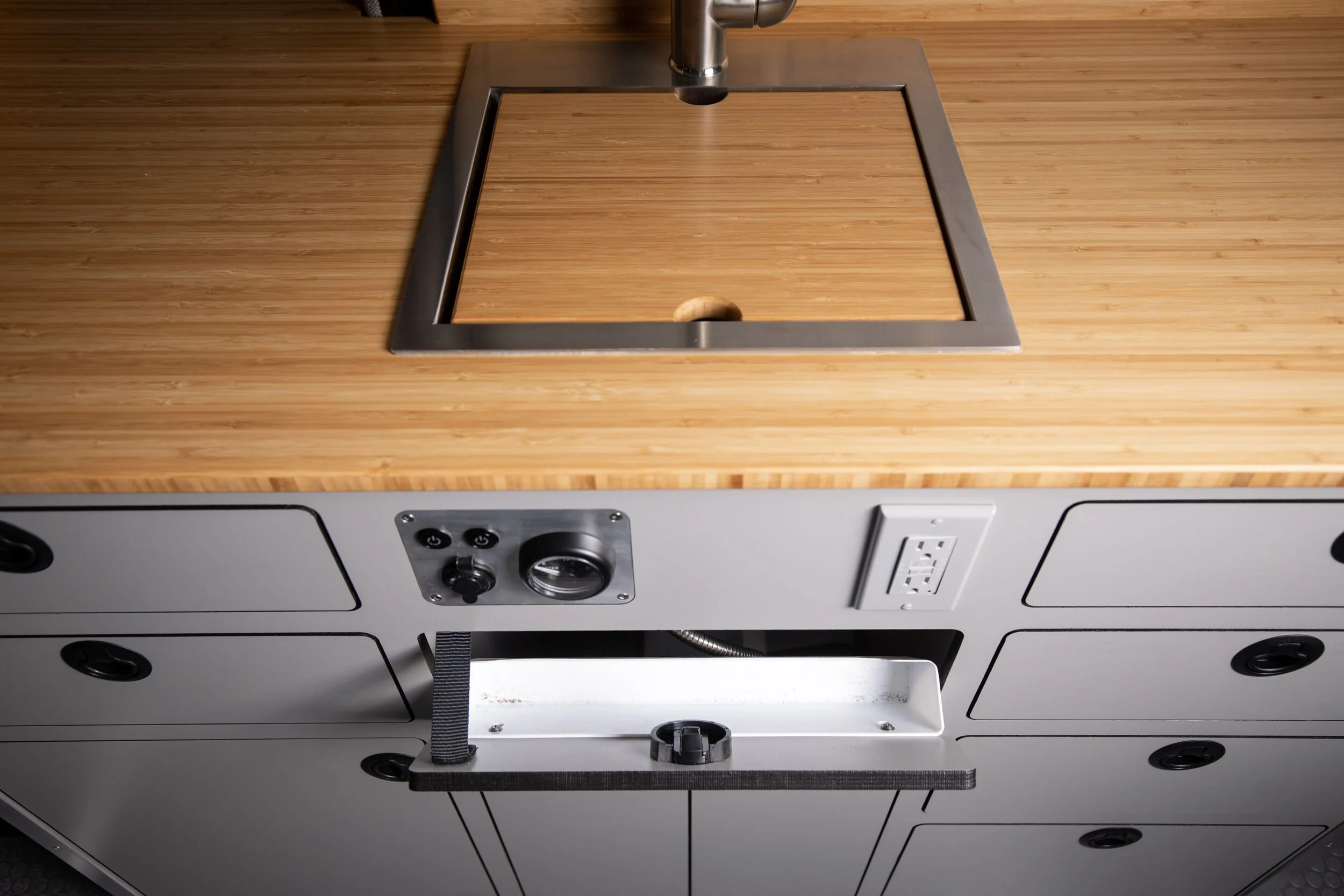 08-camper-van-galley-sink-cover-and-slide-out-drawer.jpg