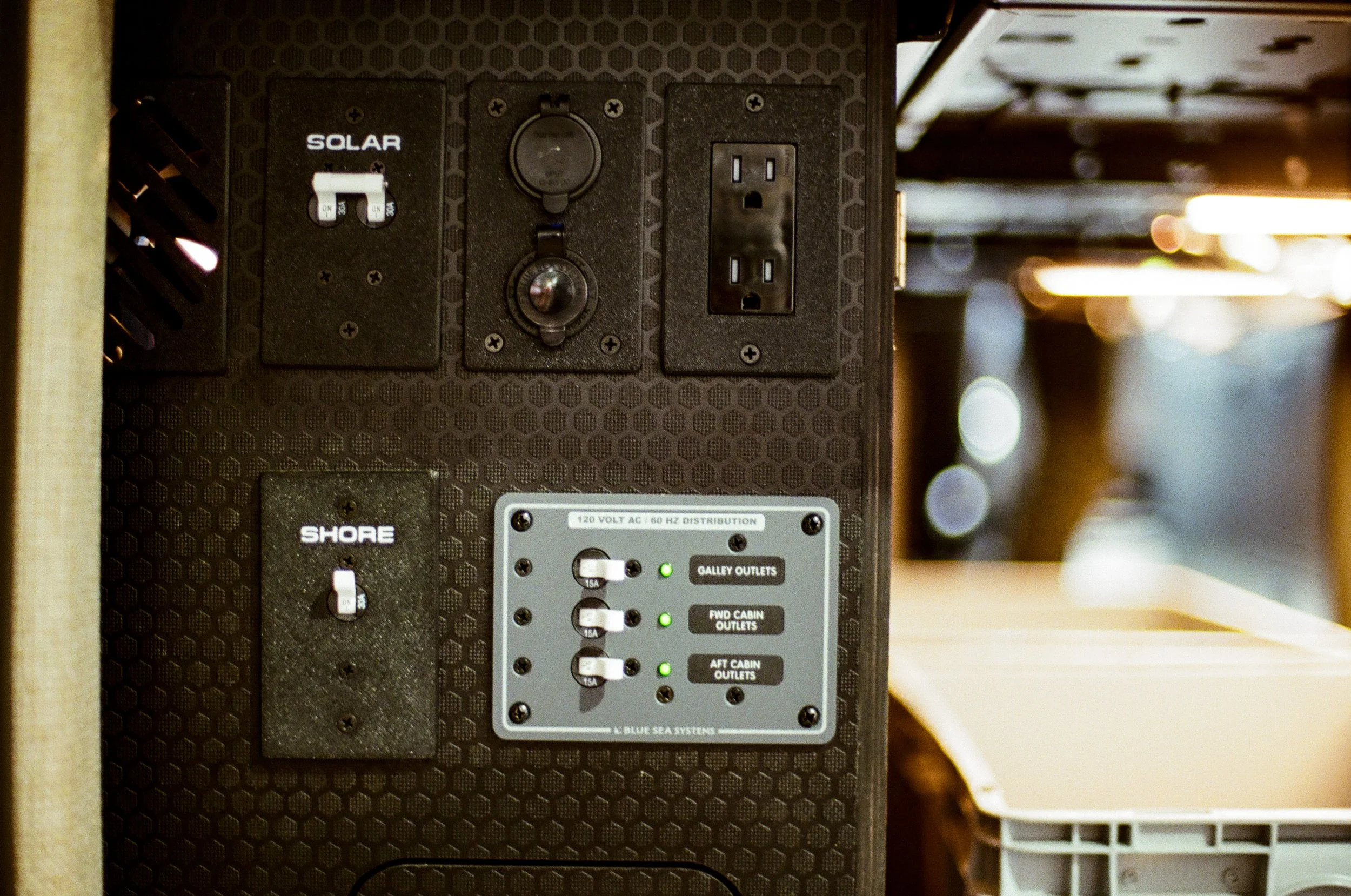 Solar Shore Power and Switch Panel in Camper Van.jpg