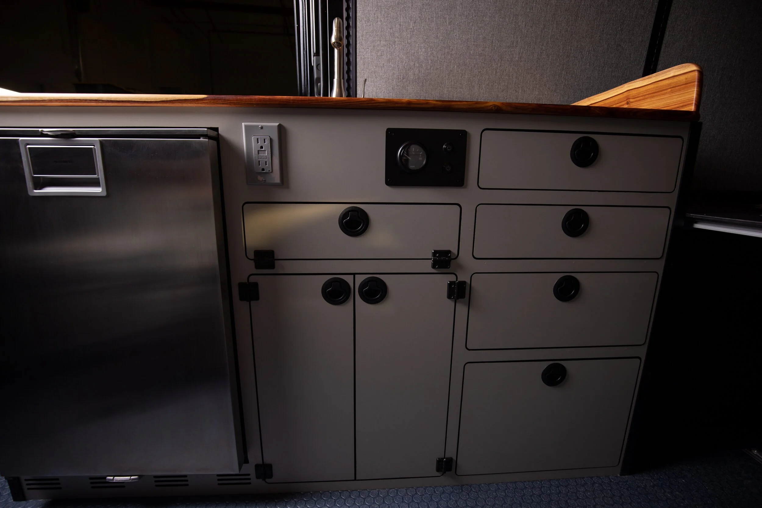 03-sprinter-170-camper-van-galley-cabinets-and-fridge.jpg