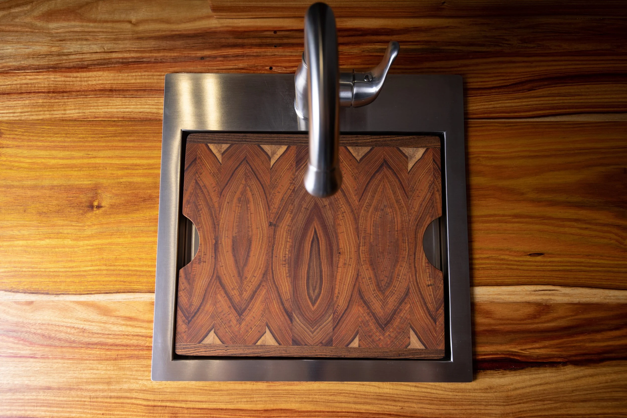 05-camper-van-sink-with-hardwood-cutting-board.jpg
