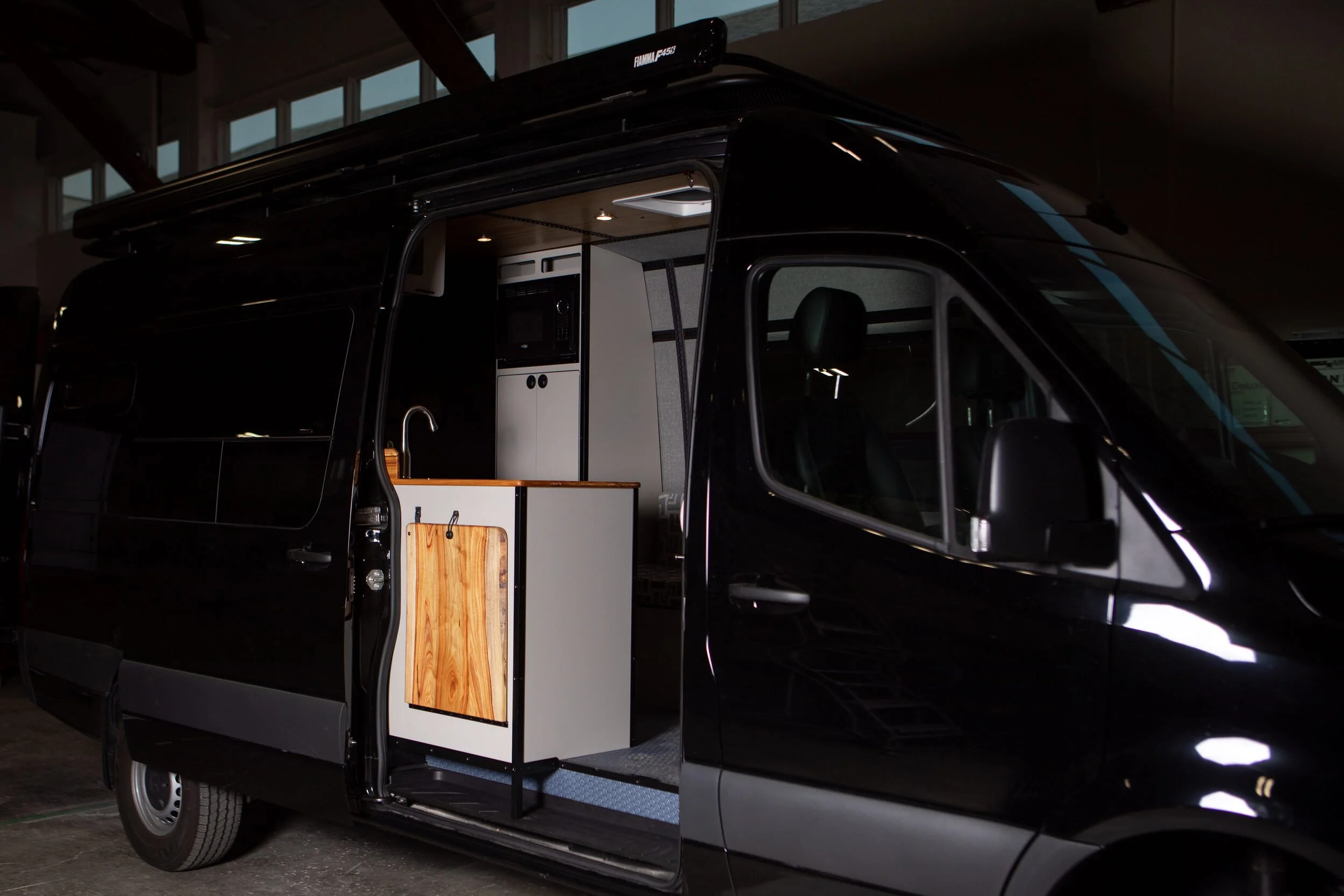 01-sprinter-170-fishing-camper-van-exterior-slider-galley.jpg