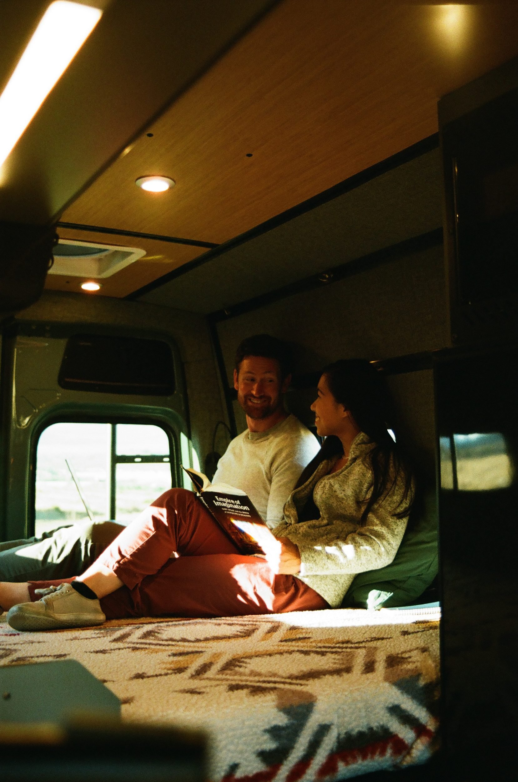 12-three-panel-murphy-bed-sprinter-170-camper-van-conversion.jpg