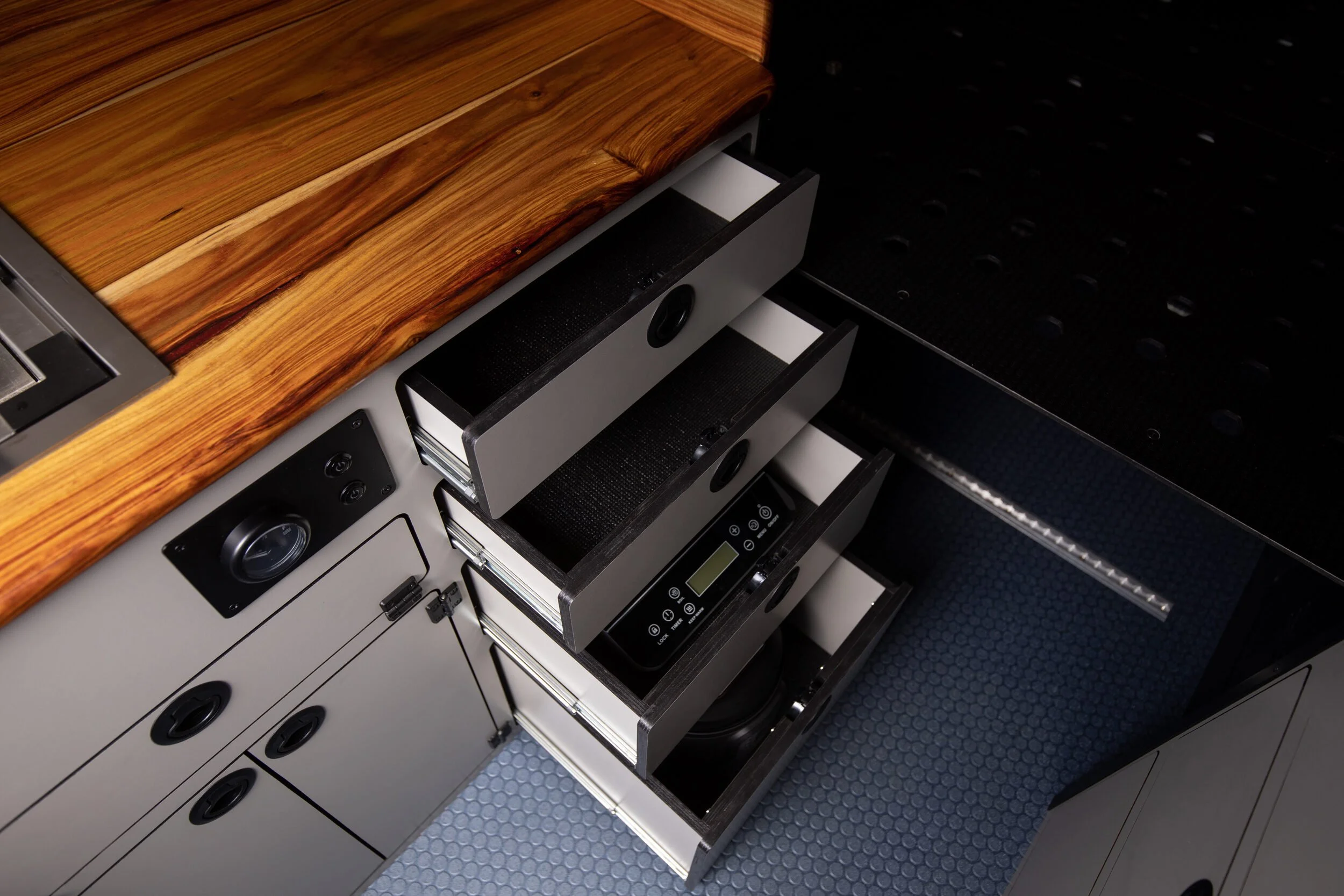 07-camper-van-galley-drawers-induction-storage.jpg