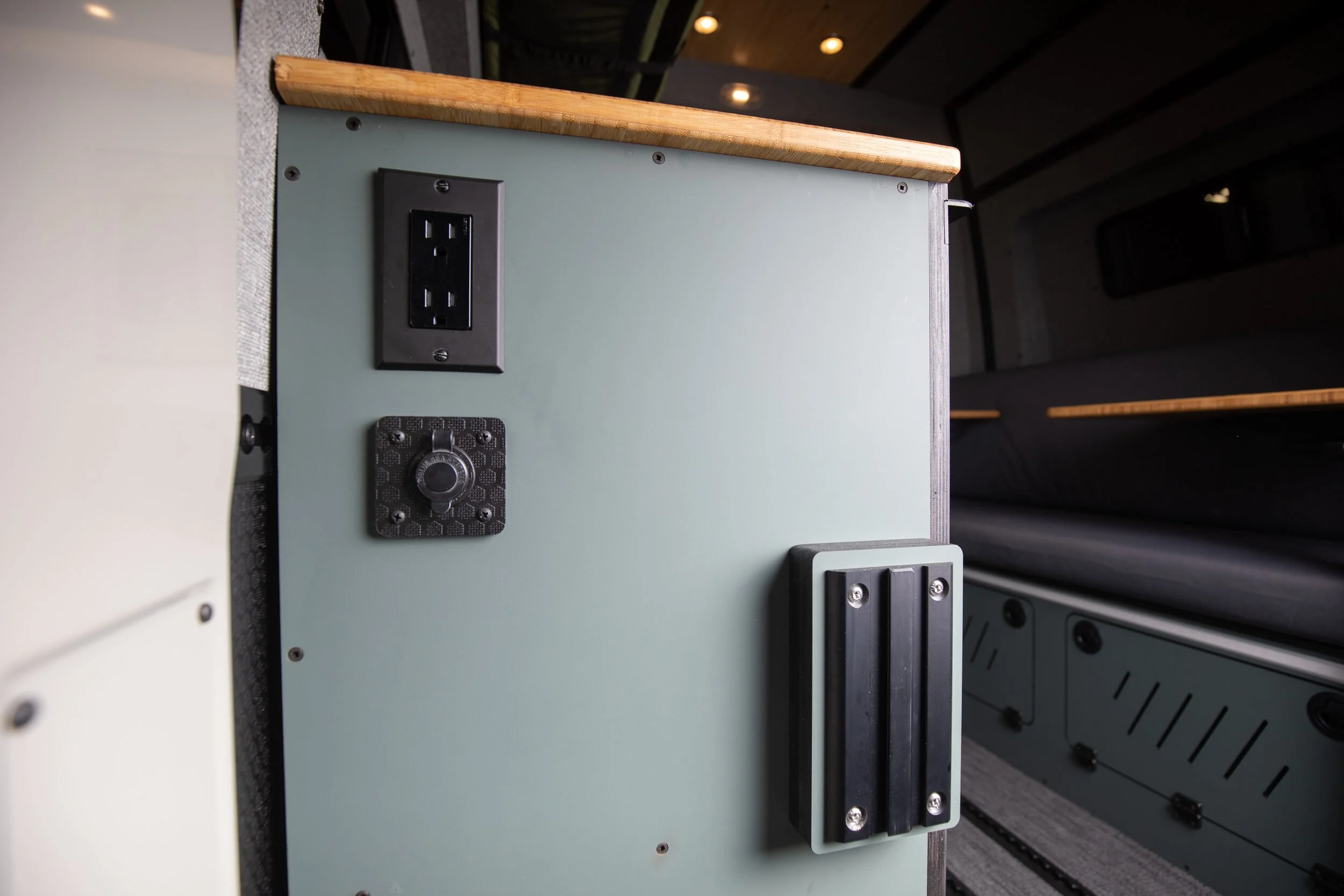 10-camper-van-cabinet-outlets-and-bamboo-top.jpg
