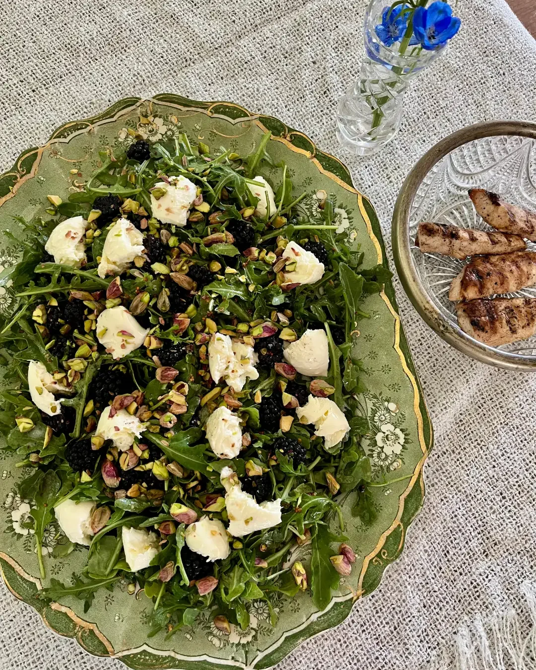 Vinaigrette rocket salad with bocconcini, berries and crushed pistachio