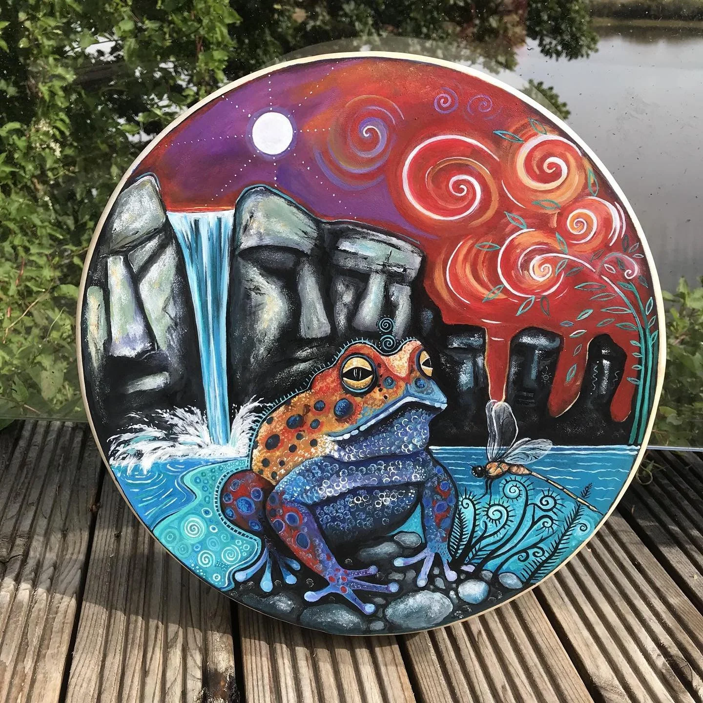 Promoting this drum titled Rainbow toad . This 16&rdquo; shaman drum is a unique design and holds the energy of transformation and resilience 
.
.
.
.
.
#drumhealing #shamanism #shamandrum #healingcircle #witchcraft #toad #fireceremony #healingarts #