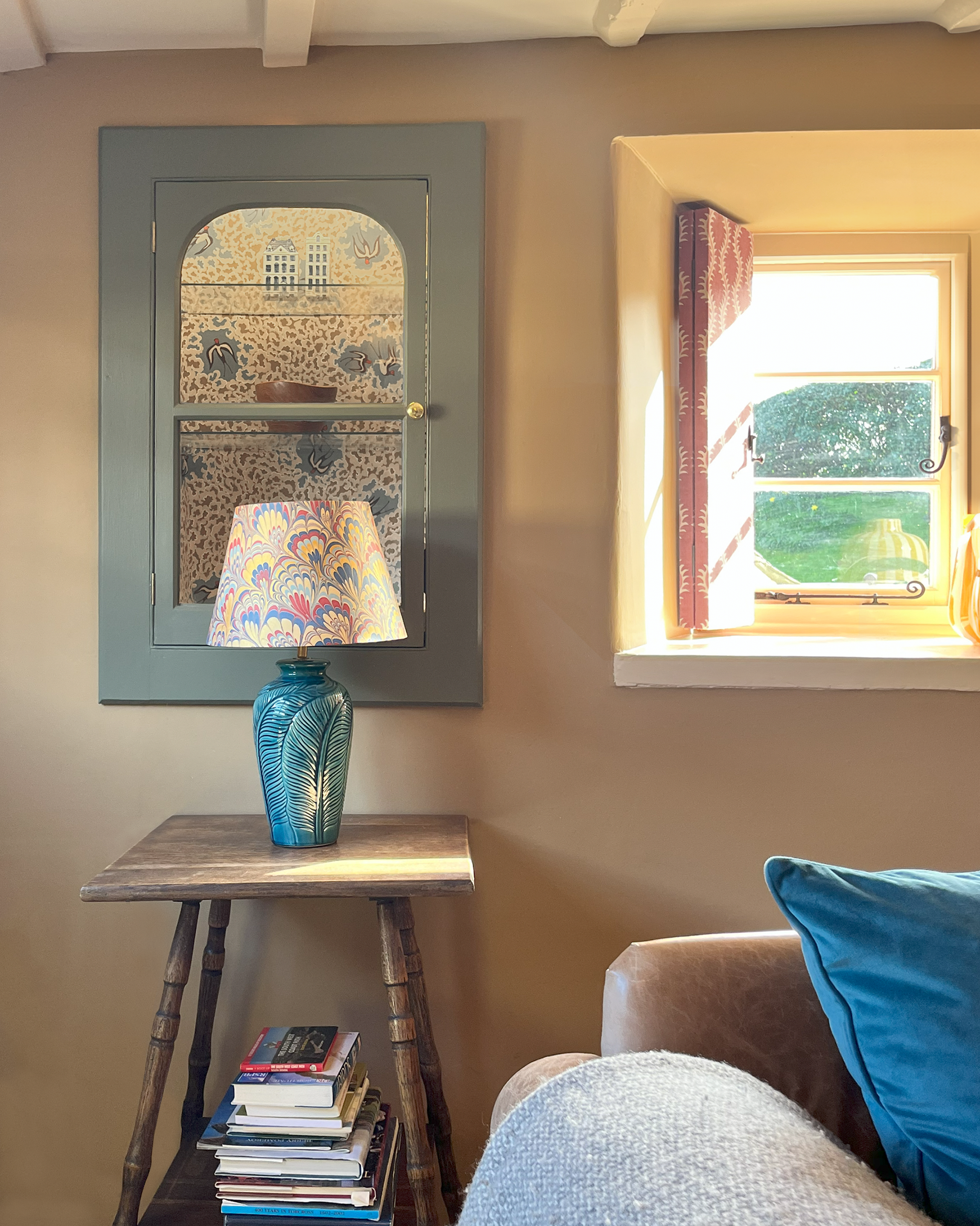 Lamp, glass cabinet niche and window