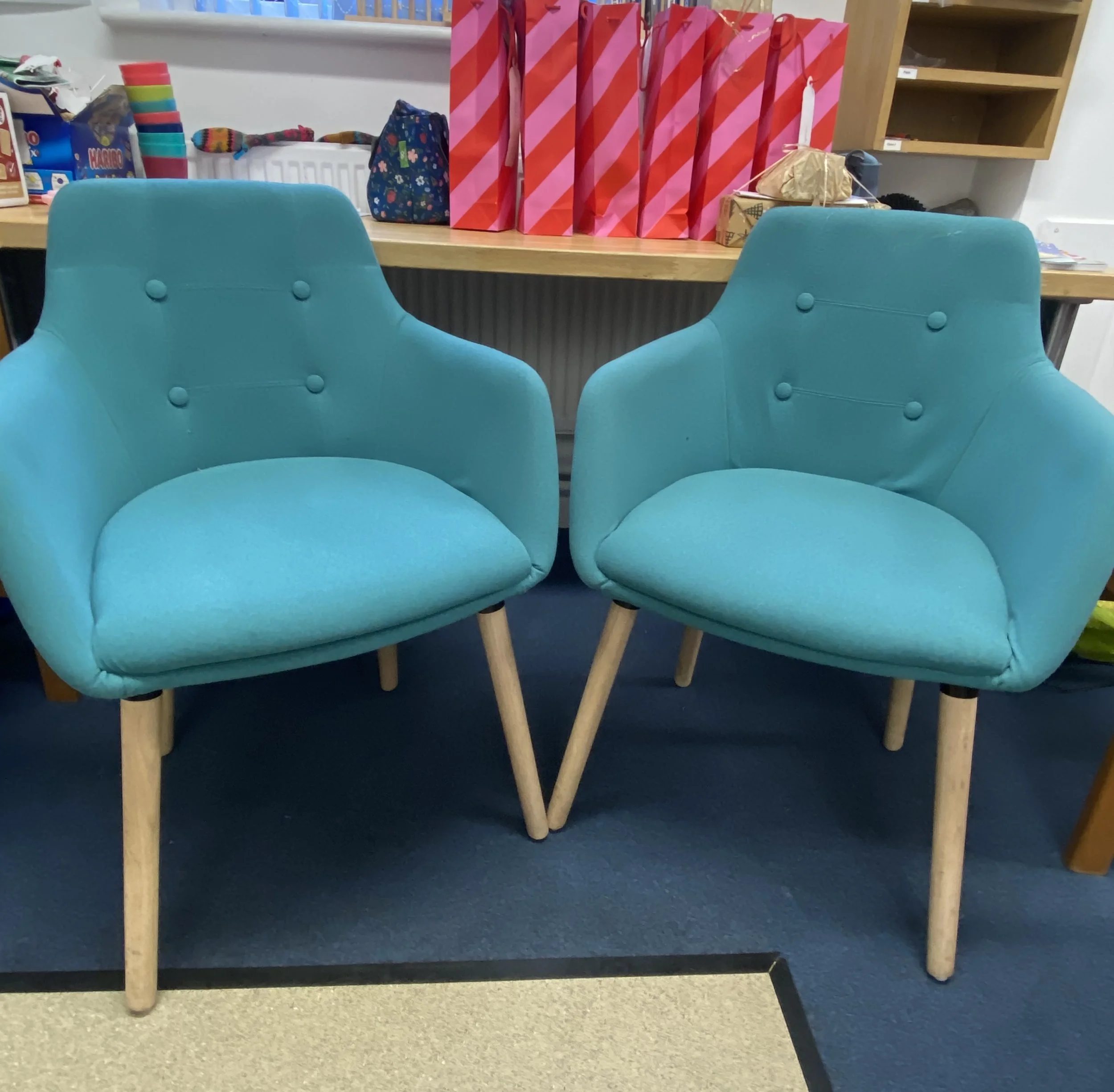 two light blue comfy arm chairs