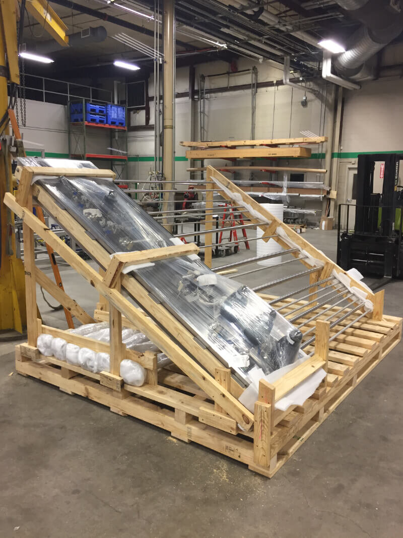 custom shipping pallets with bulky cargo secured for transport