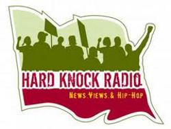 Logo for Hard Knock Radio with silhouettes of people holding signs and raising fists, with the tagline 'News, Views & Hip-Hop'.
