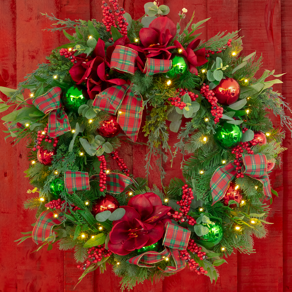 Lighted and Finely Decorated Christmas wreaths and garlands