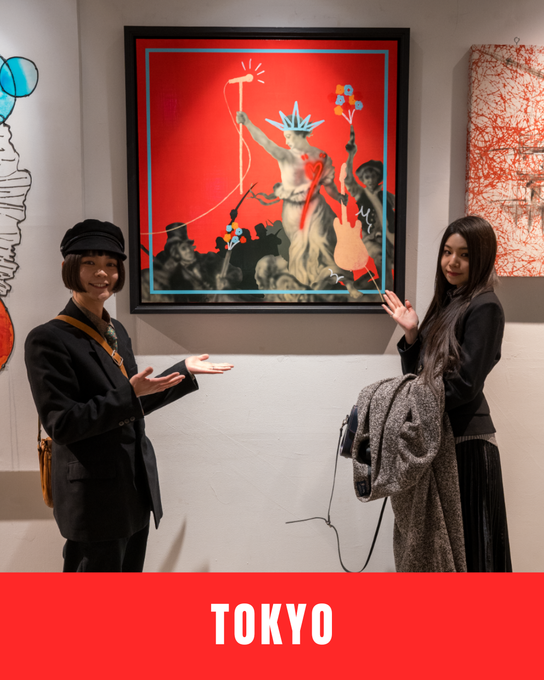 Two people in casual attire, one in a purple jacket and the other in a denim jacket, conversing indoors. The person in purple has their hand over their mouth, while the other looks at the camera holding papers. The word "Tokyo" is displayed at the bottom in bold white letters on a red background.