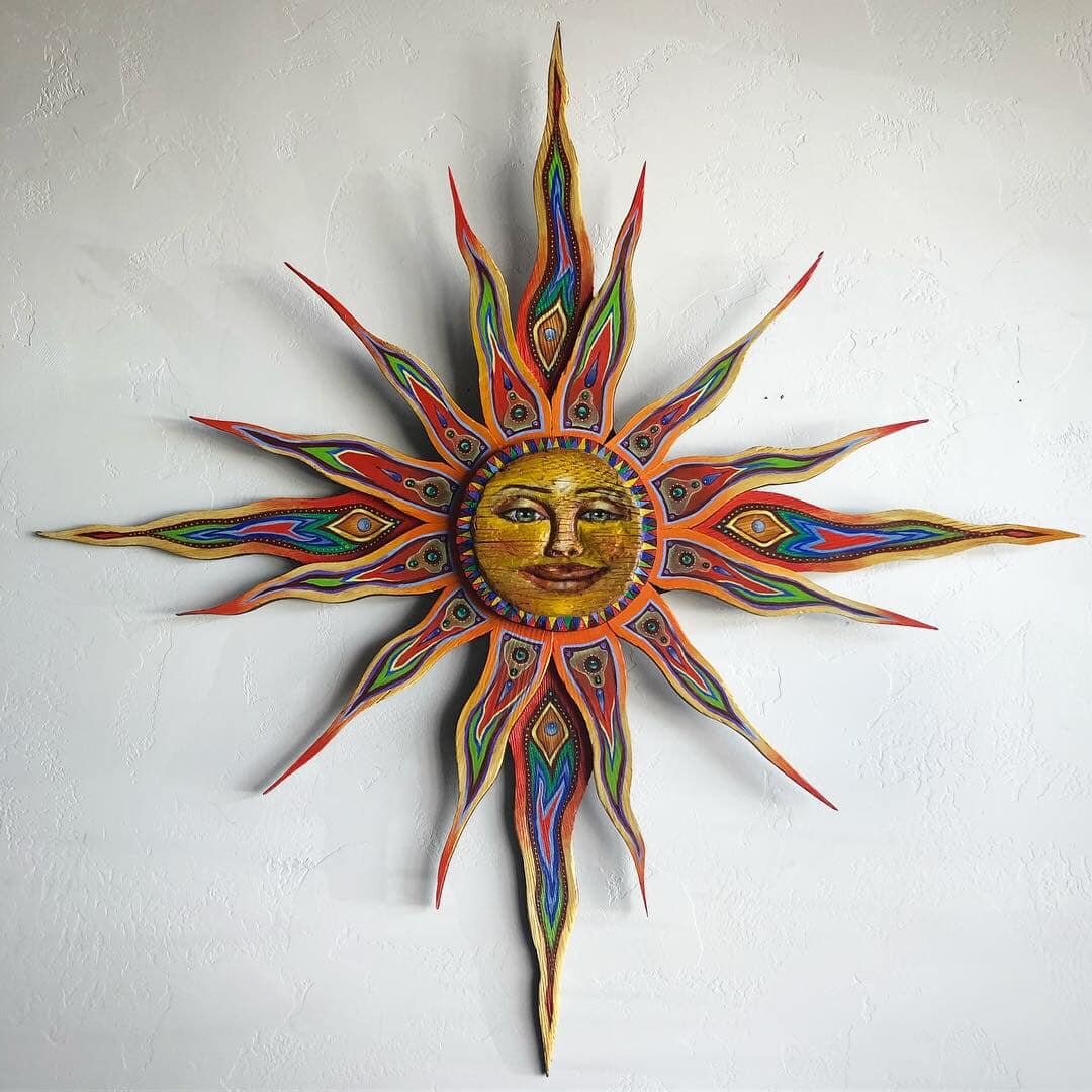 ‘Aura’ 2019
52” round (longest ray)
Oil and egg tempera on wood sun carving by Charlie Creason