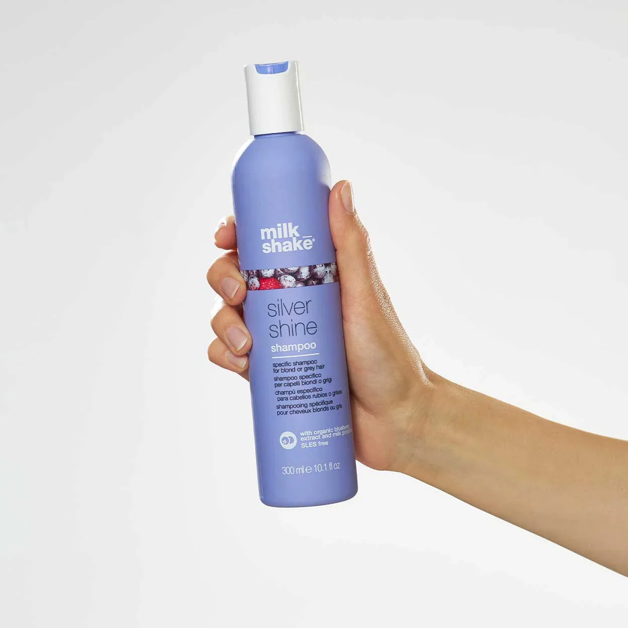 milk-shake-silver-shine-shampoo-in-hand_1296x.jpg.webp