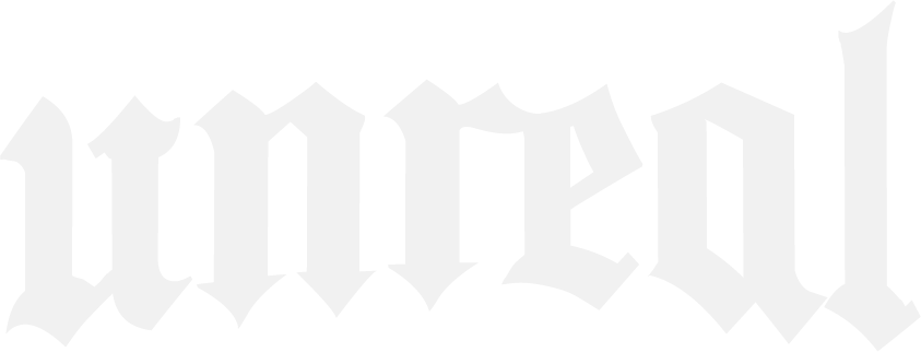 The word 'Unreal' written in white gothic-style letters on a black background.