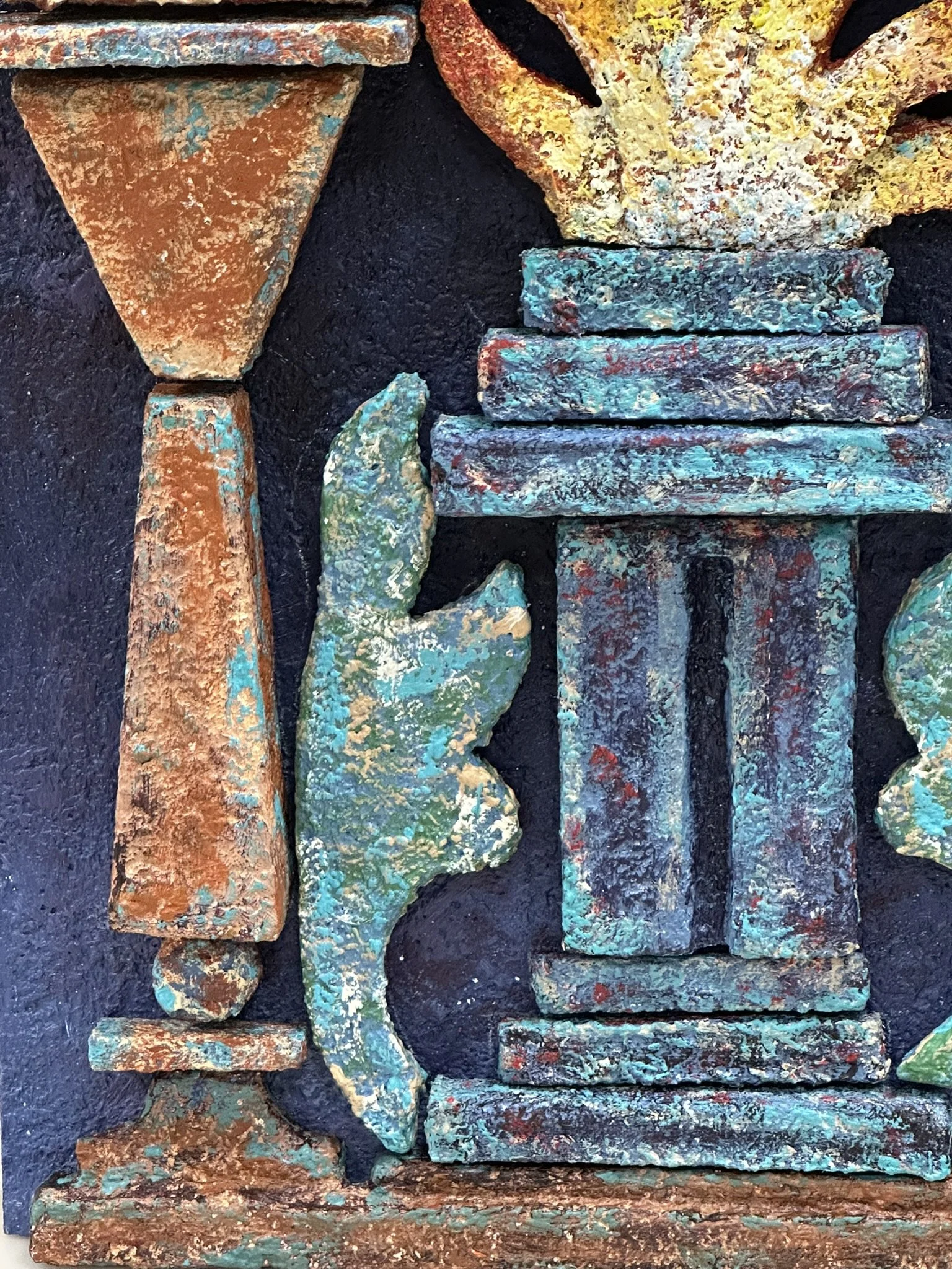 High-relief mixed-media wall sculpture featuring a central fire framed by architectural arches and geometric motifs. Inspired by Zoroastrian heritage and ancient ossuary imagerey, the work combines textured surfaces and sculptural depth.