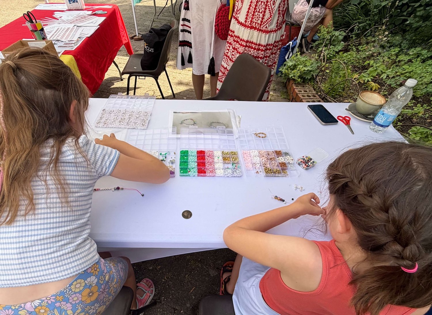 DEED Global Fair 2026 - Making bracelets - Ukranian stall.jpeg