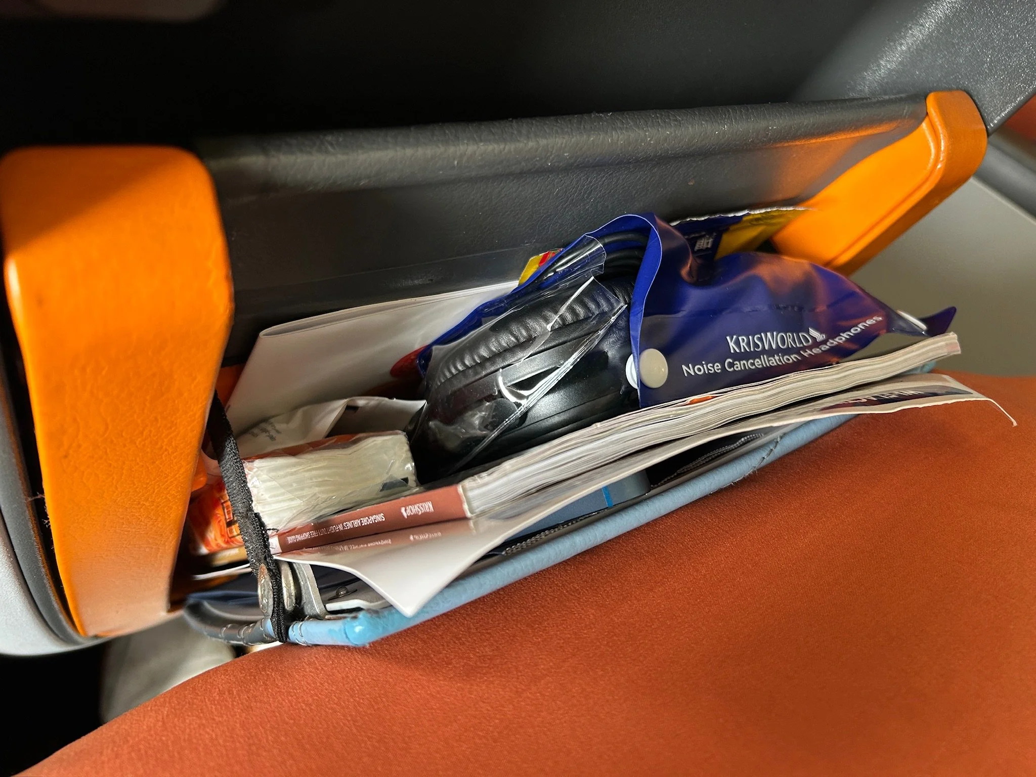 Singapore Air premium economy seat back storage