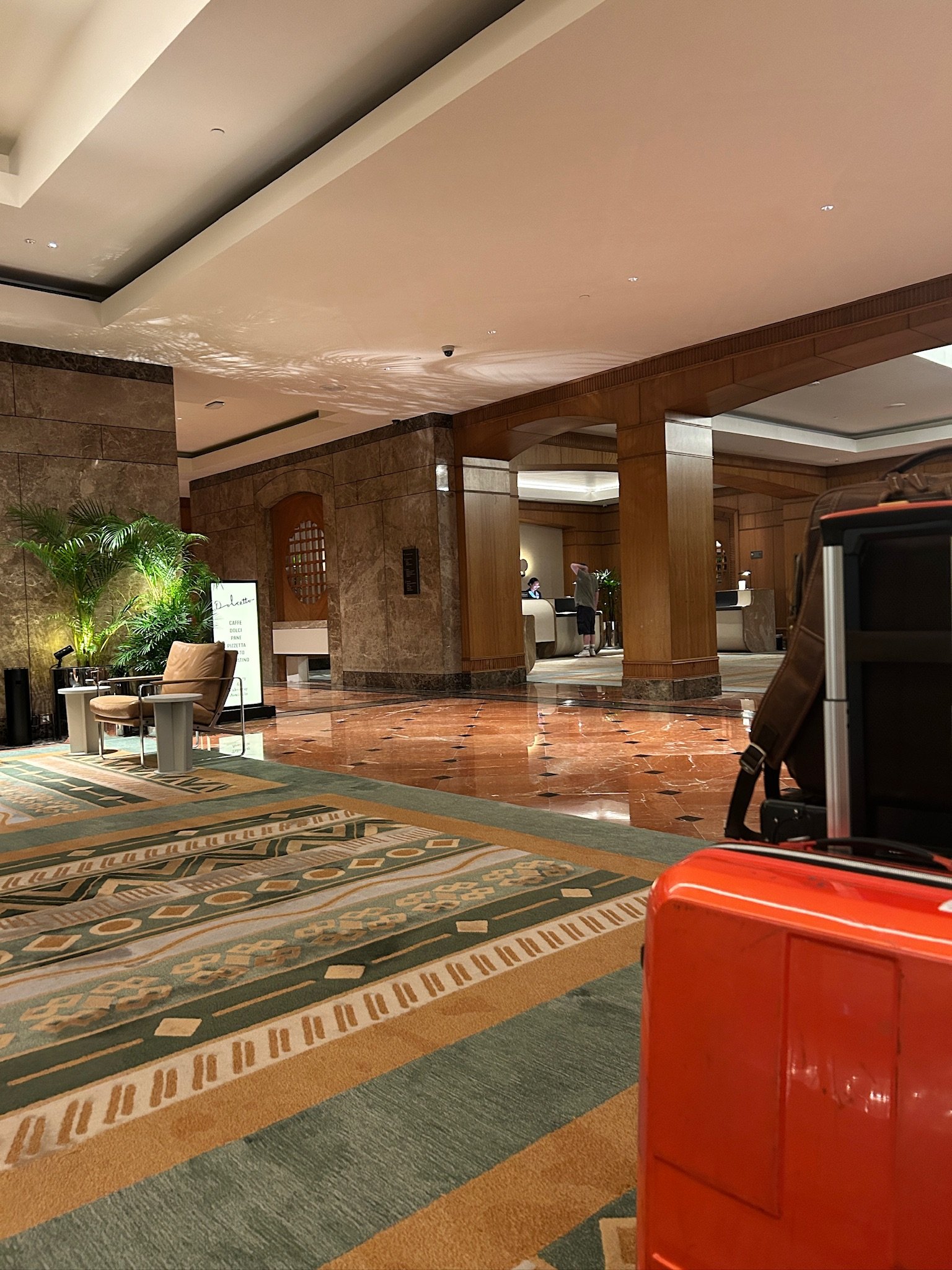 Conrad Singapore Orchard Lobby Suitcase