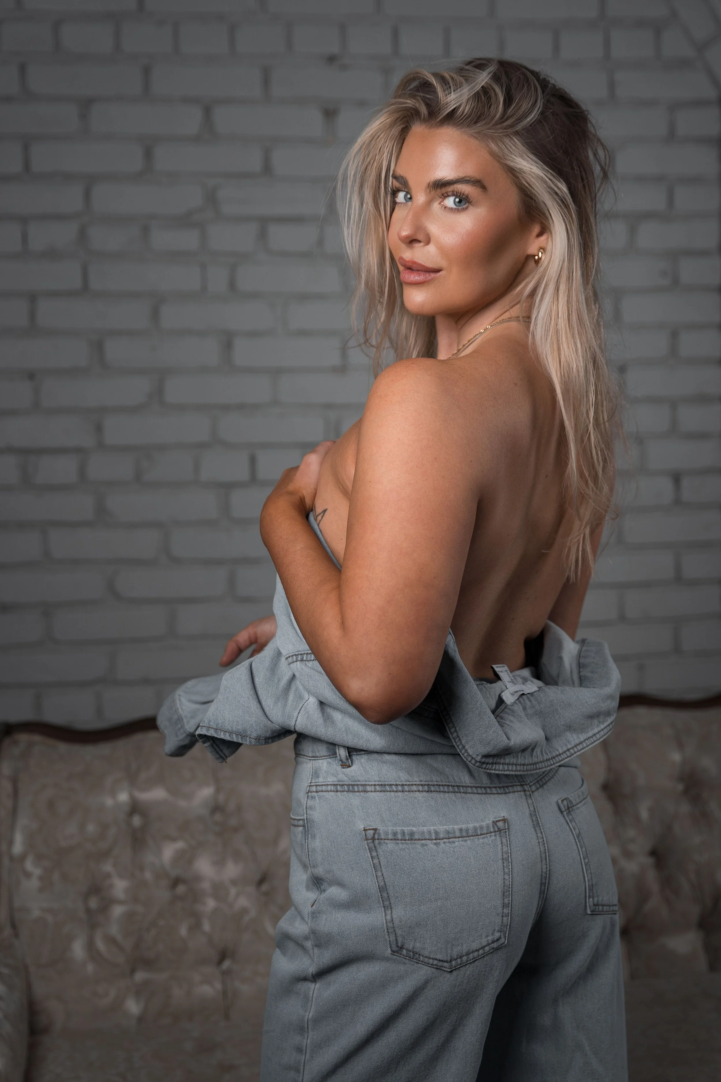 Gabby gives a soft smile to the camera in her Peabody studio session, getting comfortable in her skin and regaining her confidence.