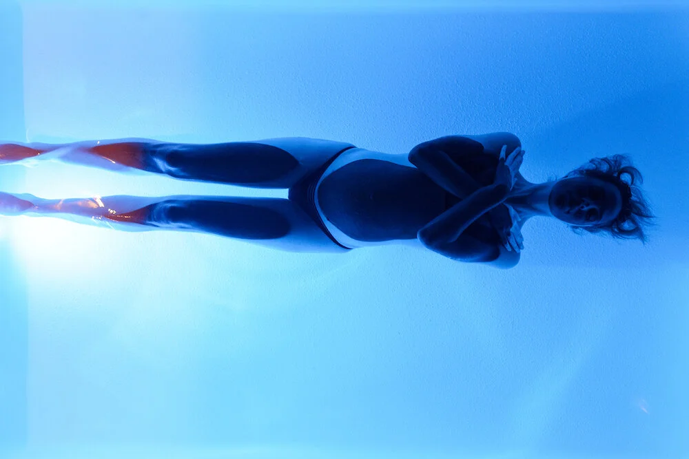 Experiment with arms across your chest