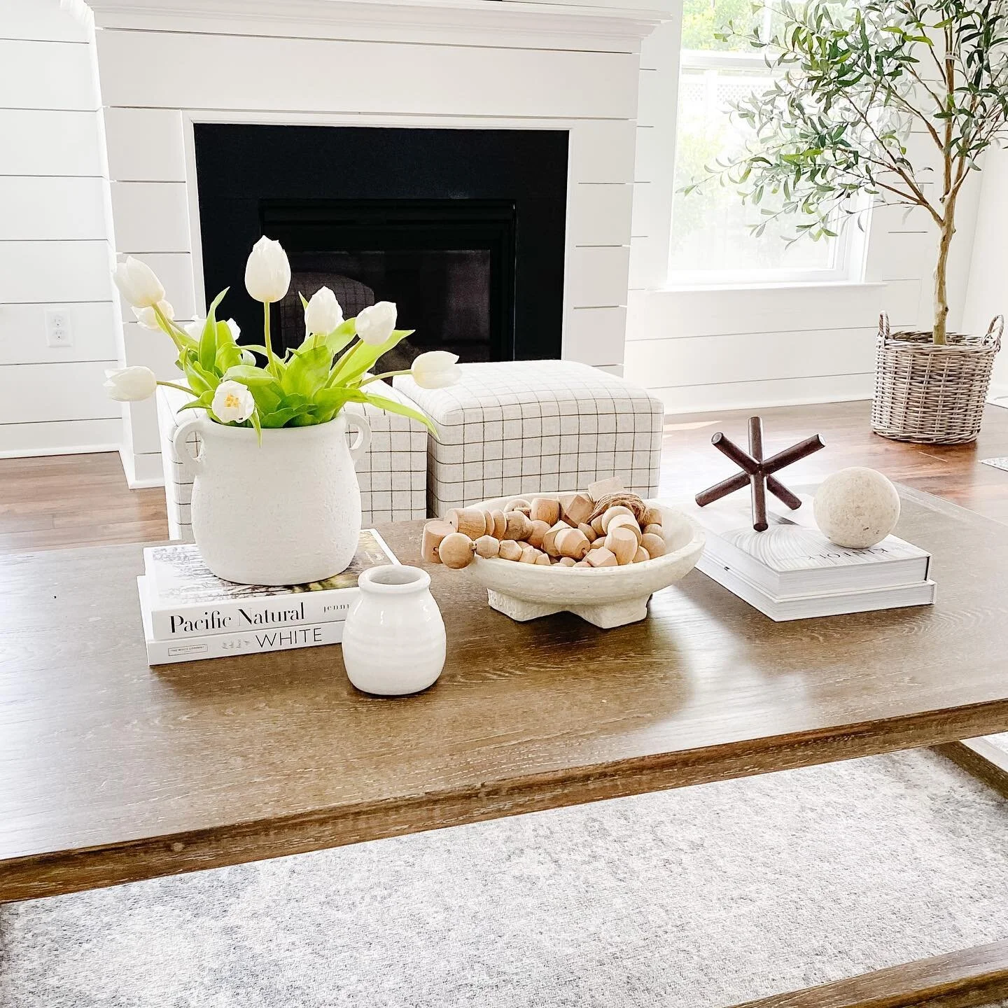 Happy weekend! White tulips bring me joy. A quick refresh of coffee table decor also brings me joy. Sometimes it can take several different arrangements to get to something you like. I always recommend gathering various decorative accessories and pla