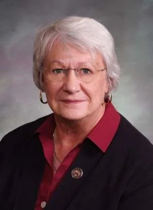 Official portrait of Representative Mary Bradfield, serving Colorado House District 21 in El Paso County; former teacher, education advocate, military family leader, and supporter of parental rights.
