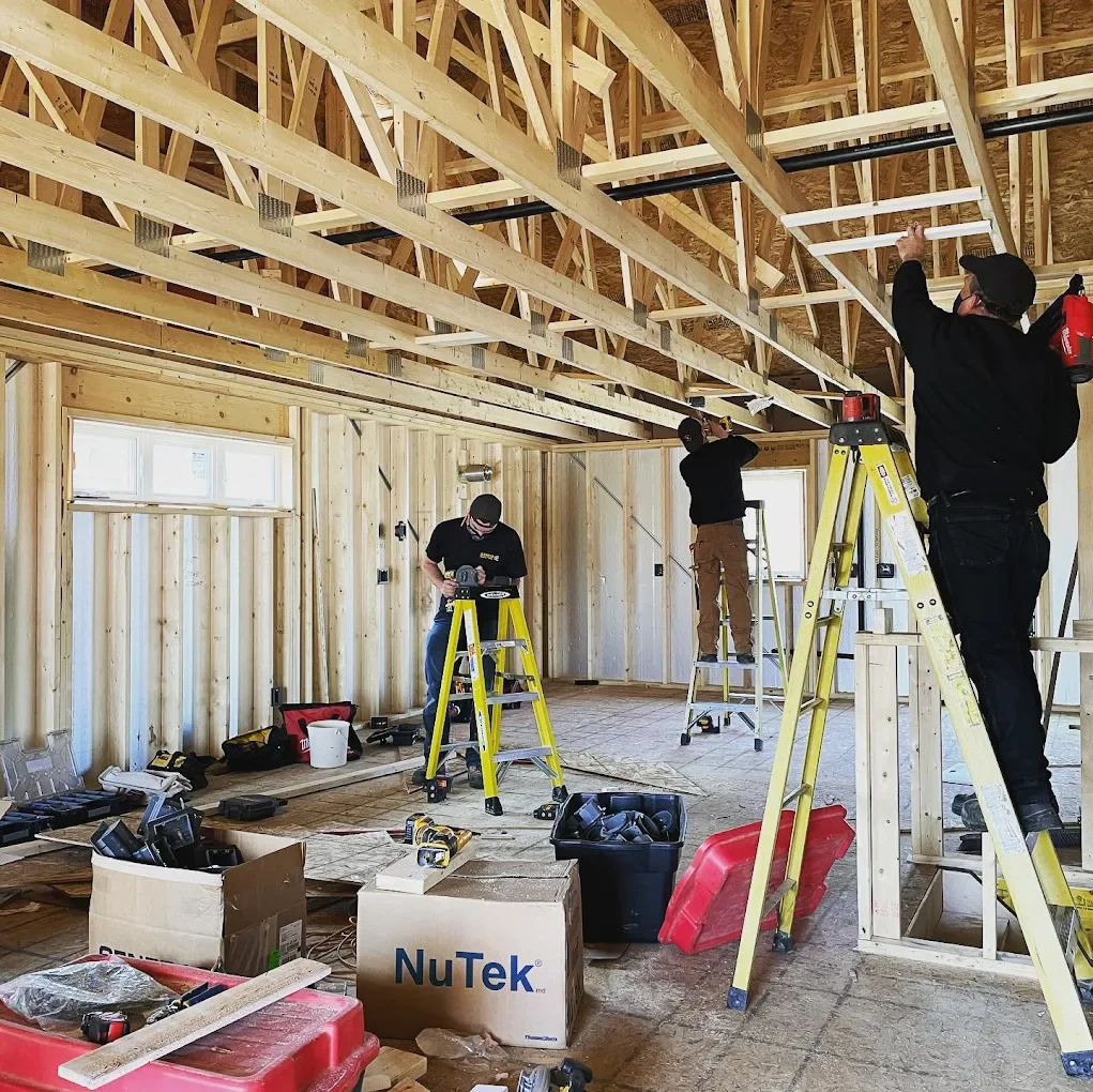 Eldridge Electric crew completing electrical rough-in during home renovation in Eastern Ontario — licensed electricians serving Brockville and surrounding area