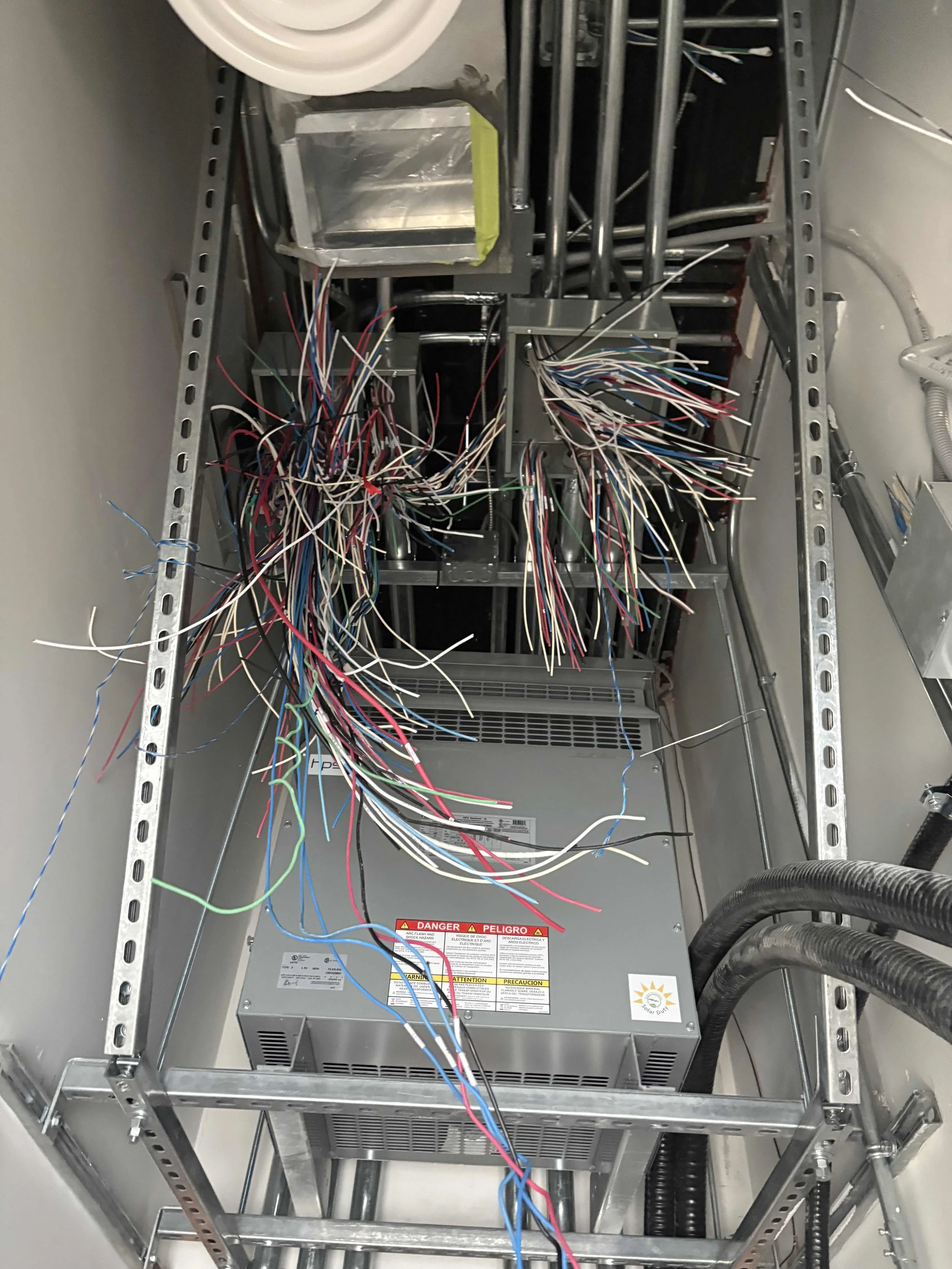 Commercial electrical panel and transformer wiring installation completed by Eldridge Electric on a large construction project in Ontario