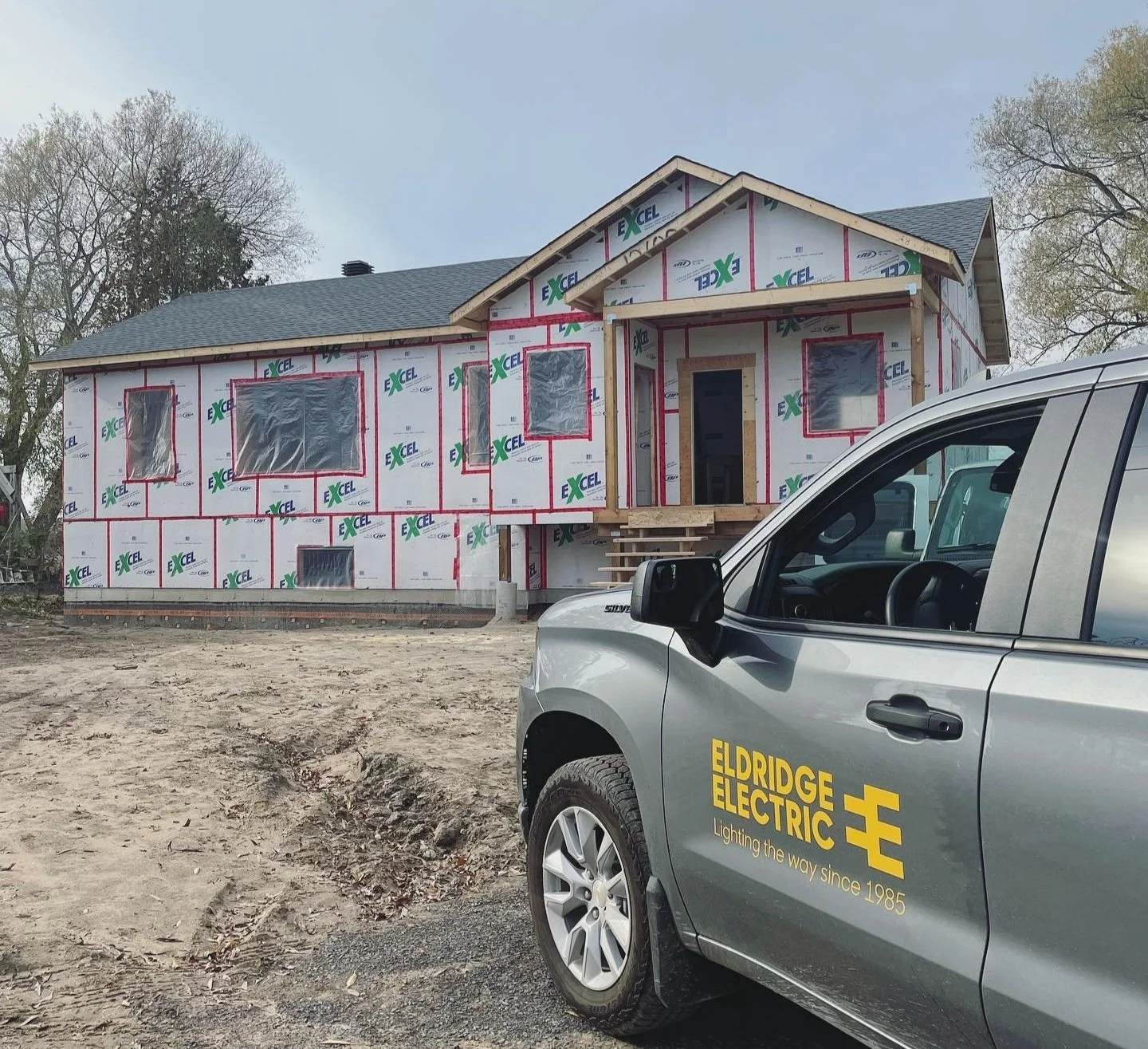 Eldridge Electric service truck on site for electrical rough-in at a new home construction project in Eastern Ontario