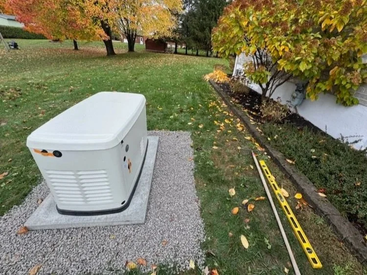 Standby generator installed on concrete pad by Eldridge Electric — residential generator installation in Eastern Ontario